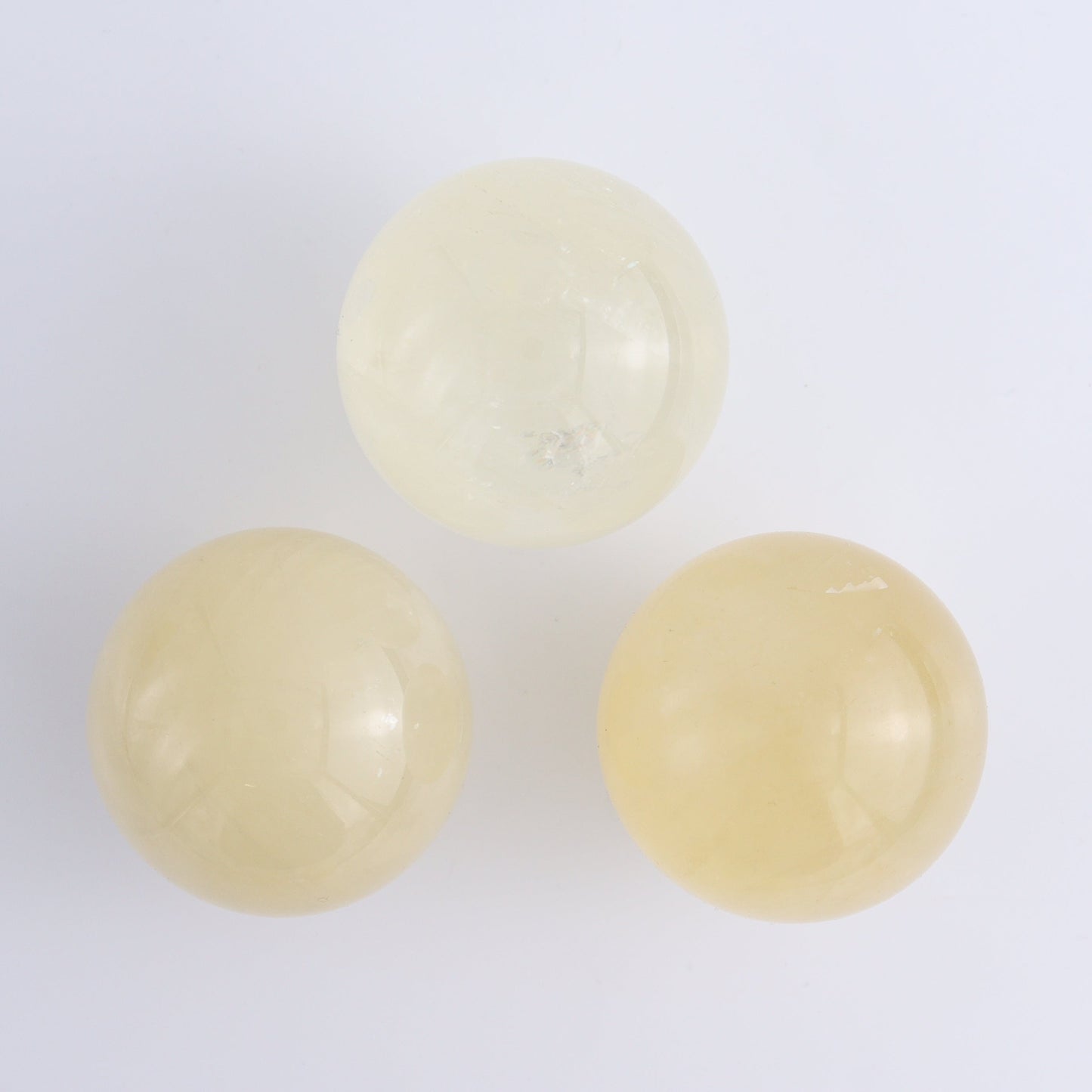 Calcite Spheres Set of 9 - Expert Wholesale and Supplier of Wholesale Crystals & Bulk Gemstones, ["Calcite","Mexico","Spheres"]