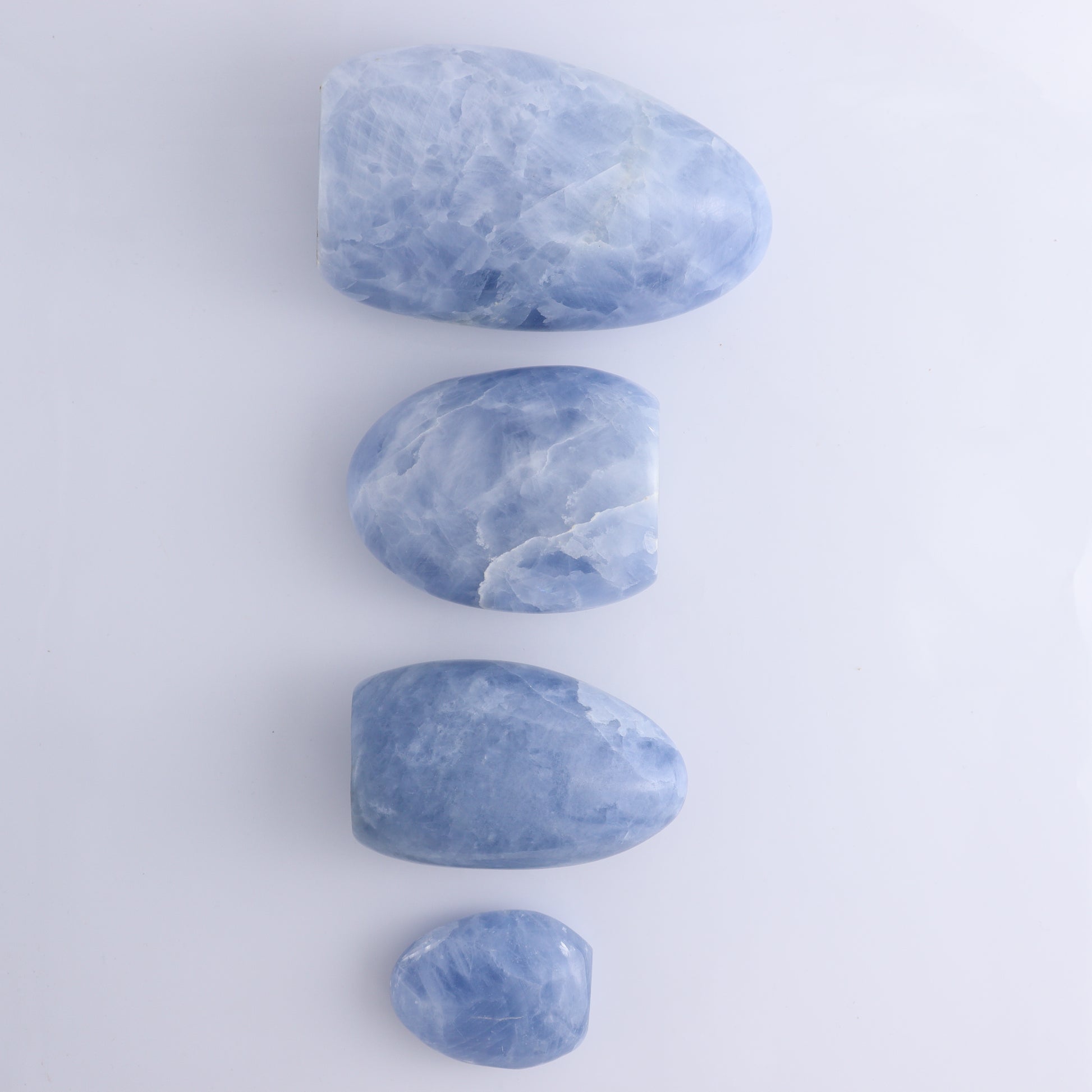 Blue Calcite Set of 4 - Expert Wholesale and Supplier of Wholesale Crystals & Bulk Gemstones, ["Blue Calcite","Calcite","Freeform","Madagascar"]