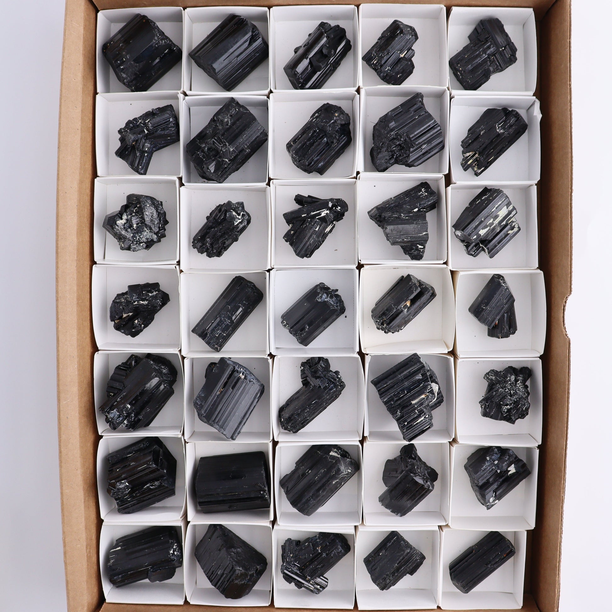 Black Tourmaline Roughs Set of 35 - Expert Wholesale and Supplier of Wholesale Crystals & Bulk Gemstones, ["Black Tourmaline","Madagascar","Rough","Tourmaline"]
