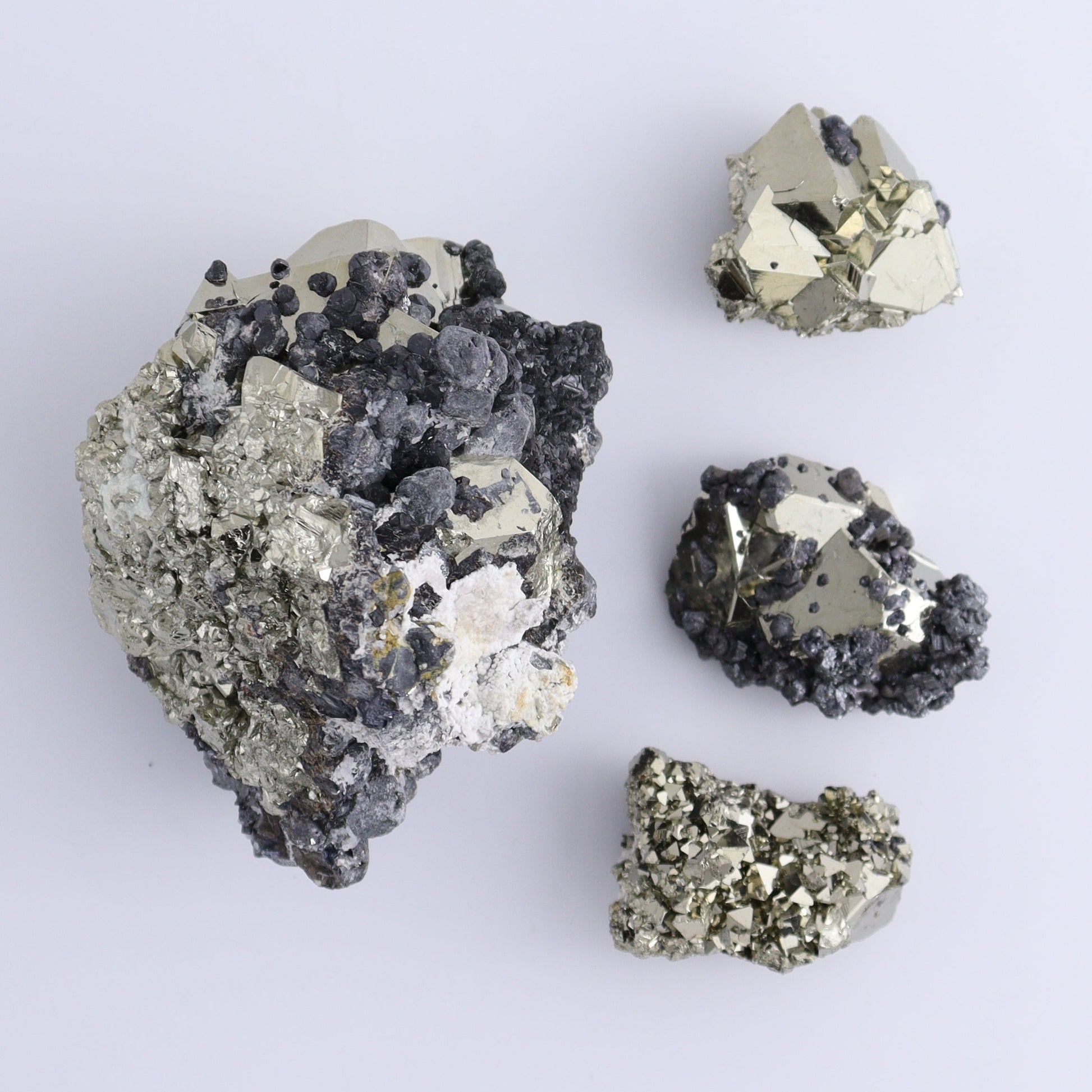 Octahedral Pyrite Clusters Set of 11 - Expert Wholesale and Supplier of Wholesale Crystals & Bulk Gemstones, ["Clusters","Octahedral Pyrite","Peru","Pyrite"]