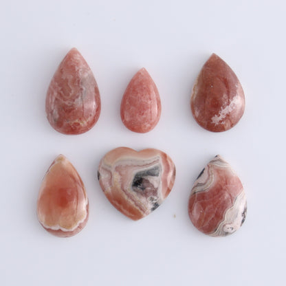 Rhodochrosite Cabs and Heart Set of 18 - Expert Wholesale and Supplier of Wholesale Crystals & Bulk Gemstones, ["Argentina","Cabs","Rhodochrosite"]