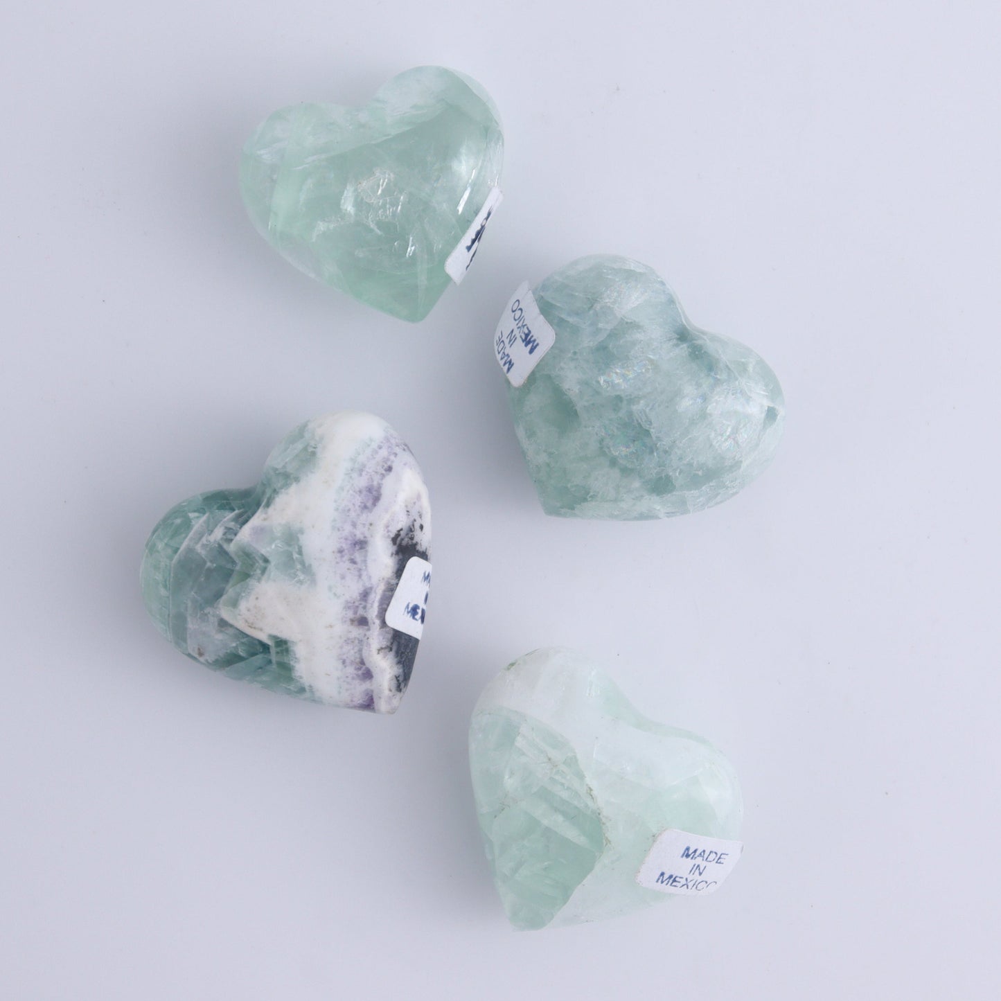 Fluorite Hearts Set of 7 - Expert Wholesale and Supplier of Wholesale Crystals & Bulk Gemstones, ["Fluorite","Hearts","Mexico"]