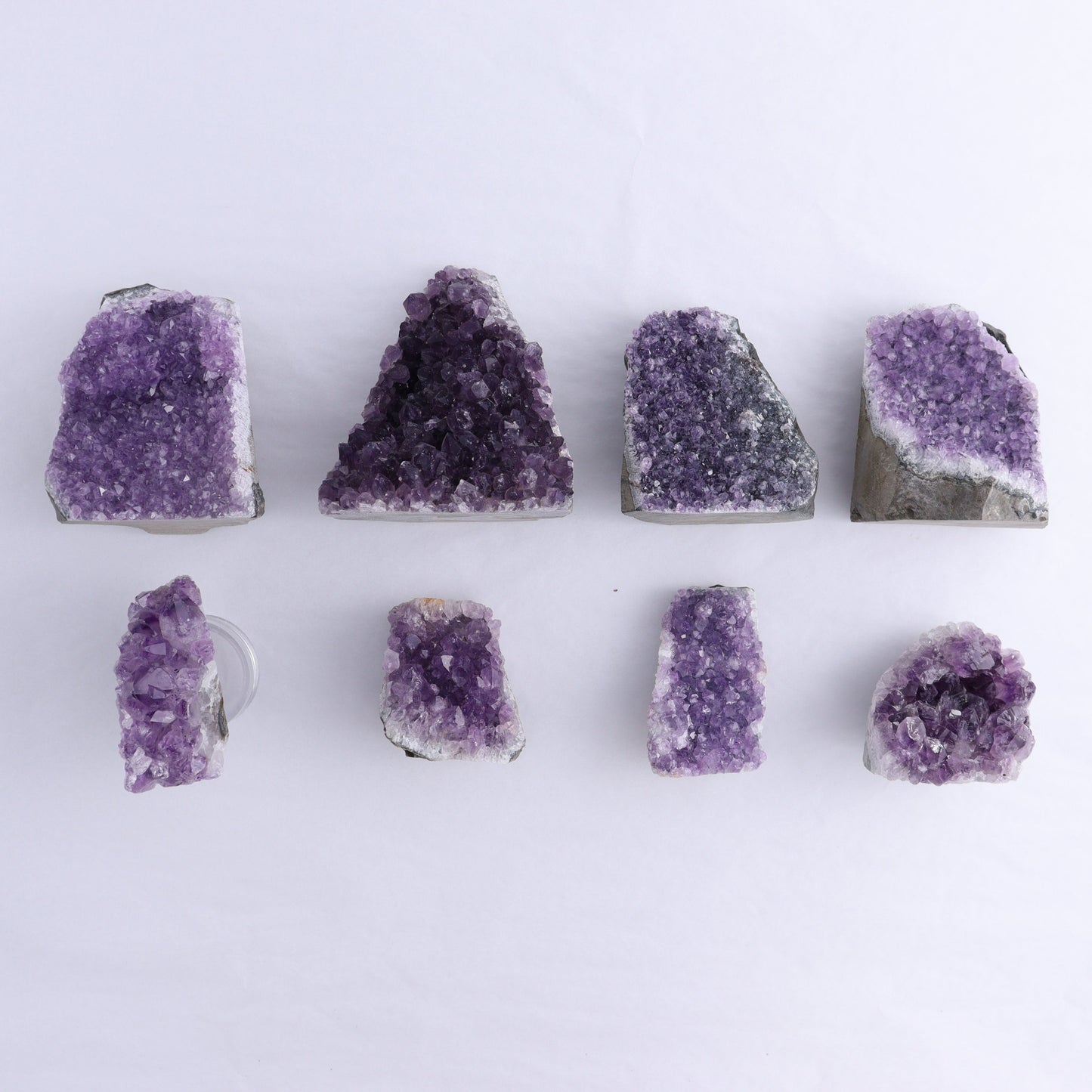Uruguay Amethyst Cut Base Set of 8 - Expert Wholesale and Supplier of Wholesale Crystals & Bulk Gemstones, ["Amethyst","Cut Base","Uruguay"]