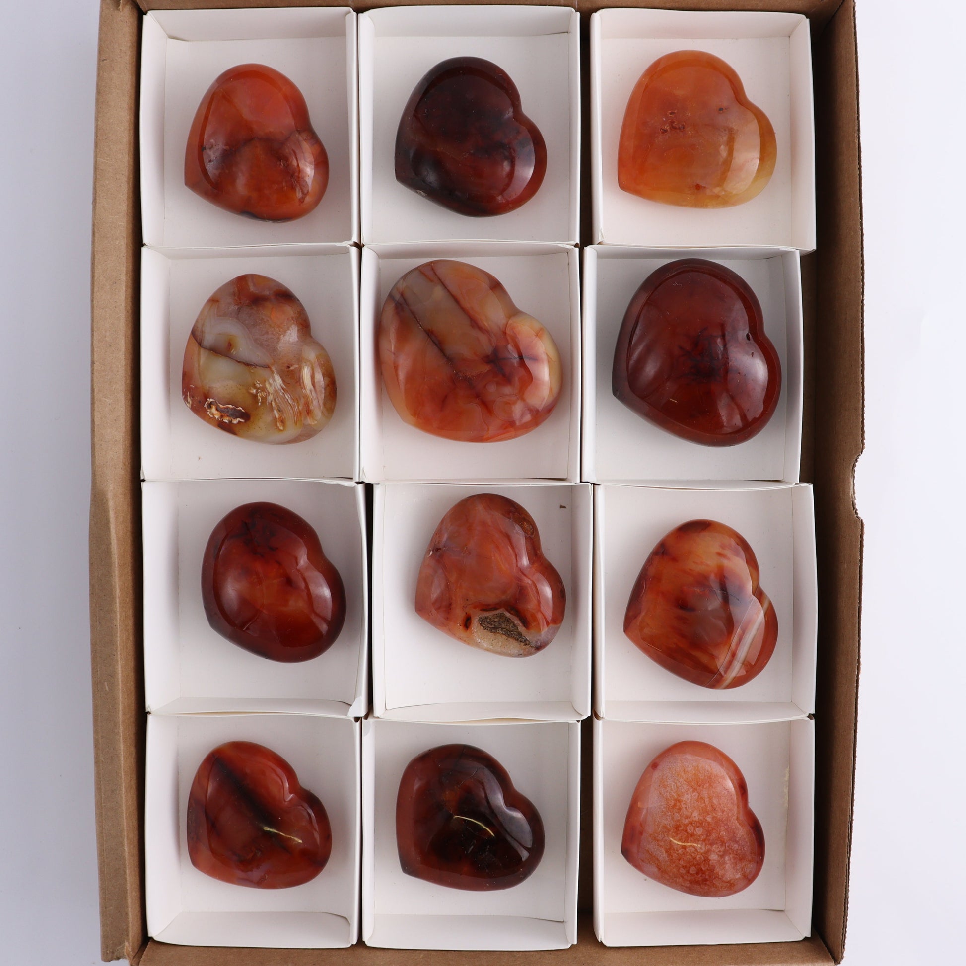Carnelian Hearts Set of 12 - Expert Wholesale and Supplier of Wholesale Crystals & Bulk Gemstones, ["carnelian","Hearts","Madagascar"]