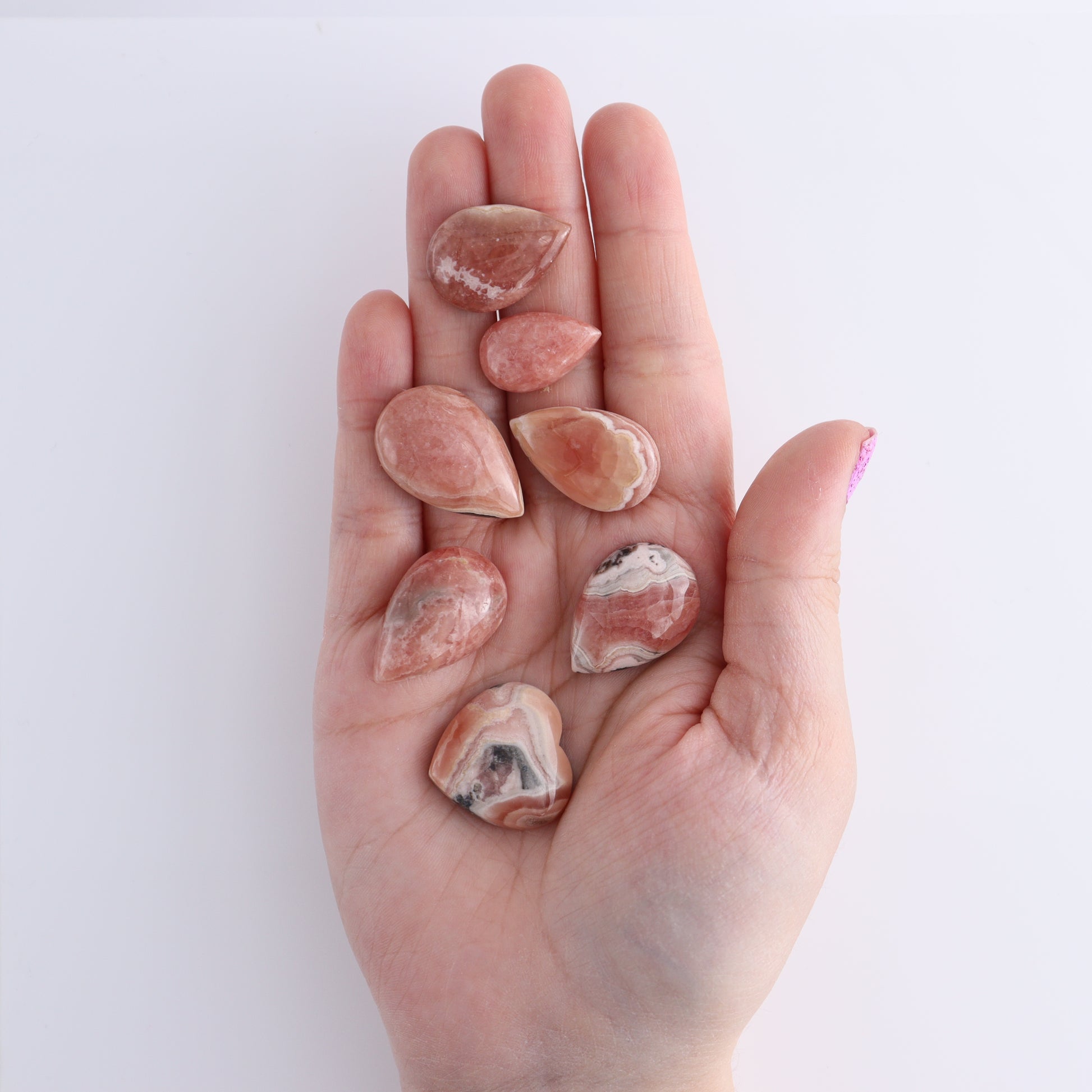 Rhodochrosite Cabs and Heart Set of 18 - Expert Wholesale and Supplier of Wholesale Crystals & Bulk Gemstones, ["Argentina","Cabs","Rhodochrosite"]