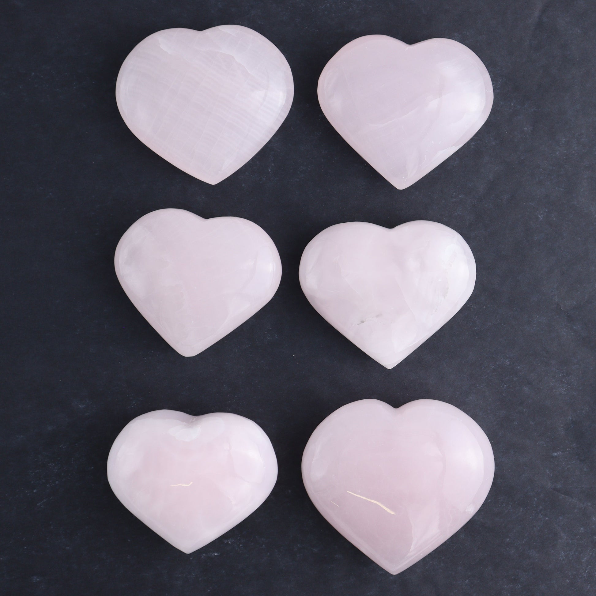 Pink Mangano Calcite Hearts Set of 6 - Expert Wholesale and Supplier of Wholesale Crystals & Bulk Gemstones, ["Calcite","Hearts","Madagascar","Pink Calcite"]