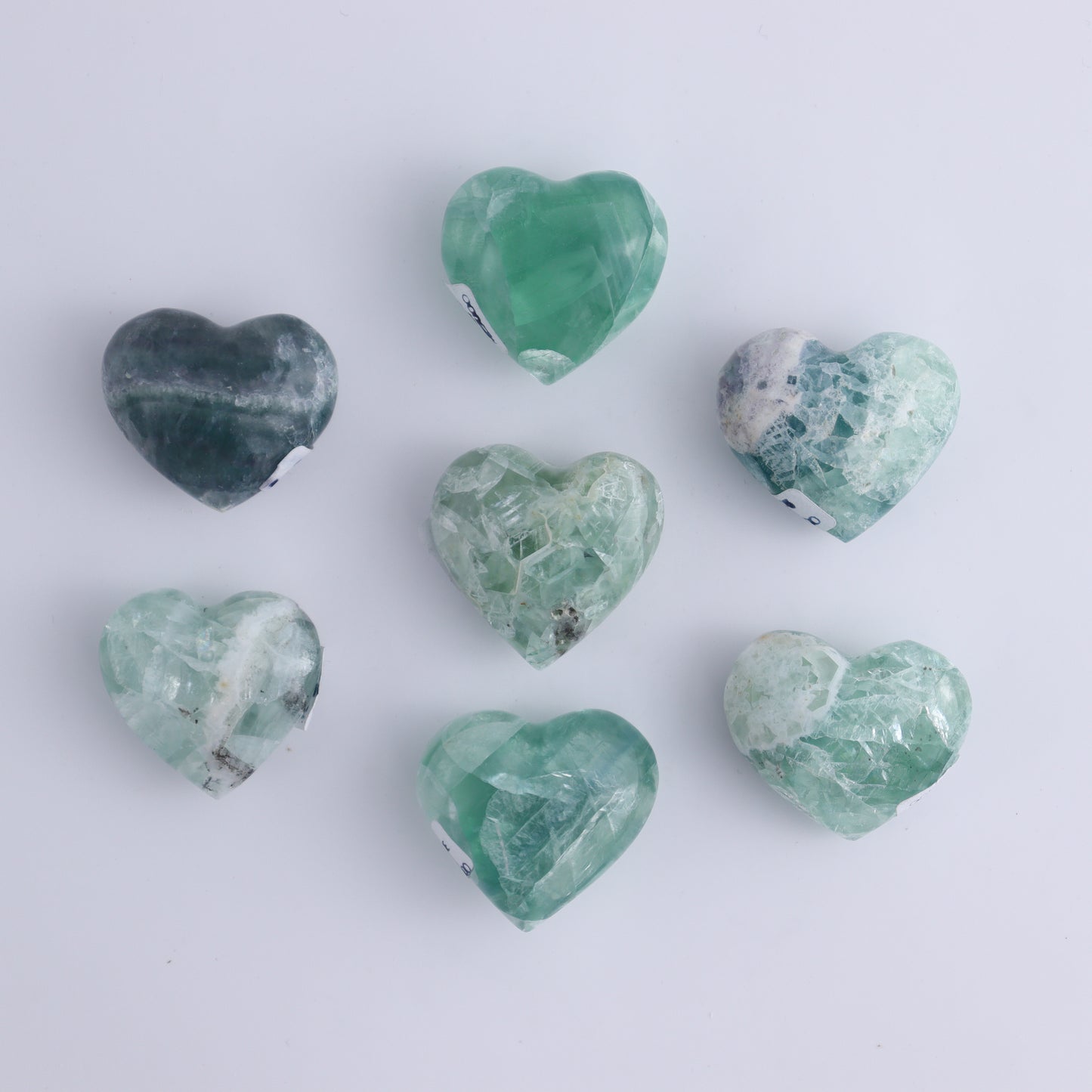 Fluorite Hearts Set of 7 - Expert Wholesale and Supplier of Wholesale Crystals & Bulk Gemstones, ["Fluorite","Hearts","Mexico"]