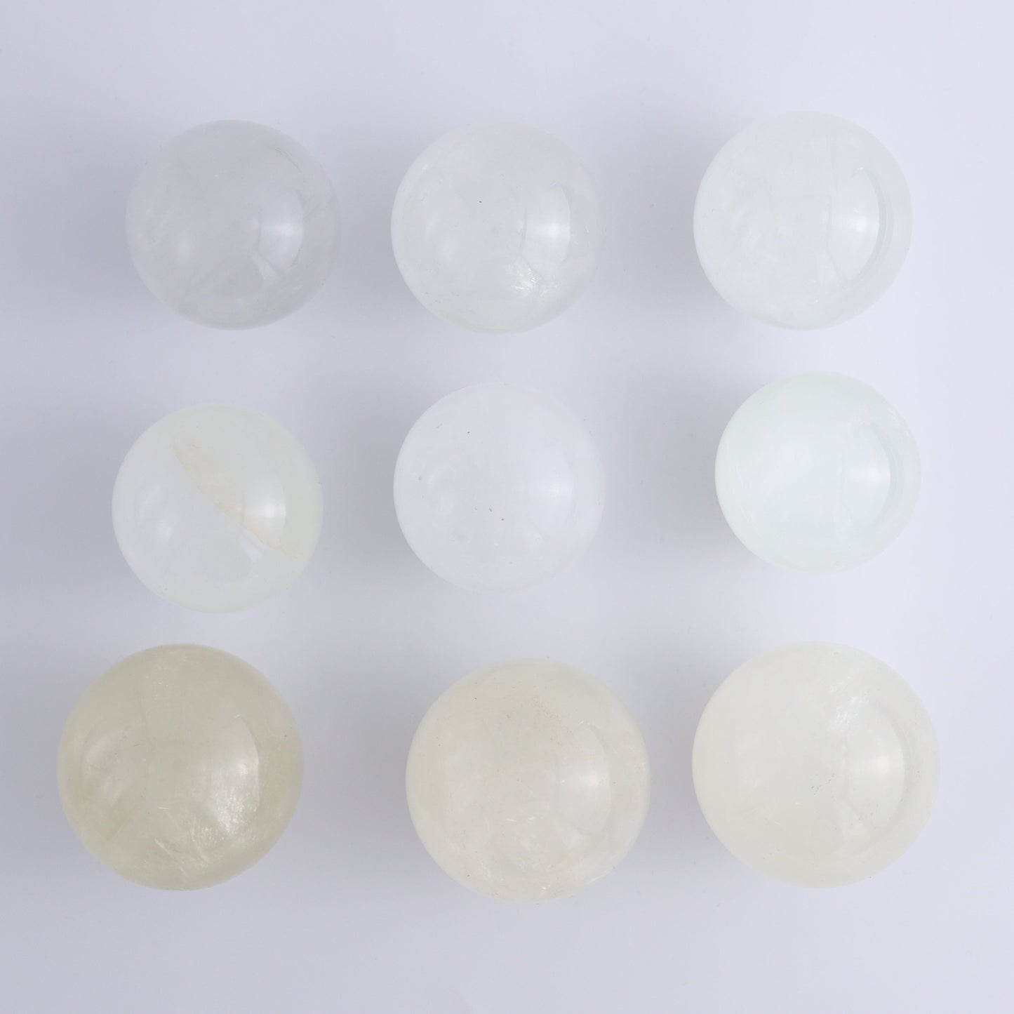 Calcite Spheres Set of 9 - Expert Wholesale and Supplier of Wholesale Crystals & Bulk Gemstones, ["Calcite","Mexico","Spheres"]