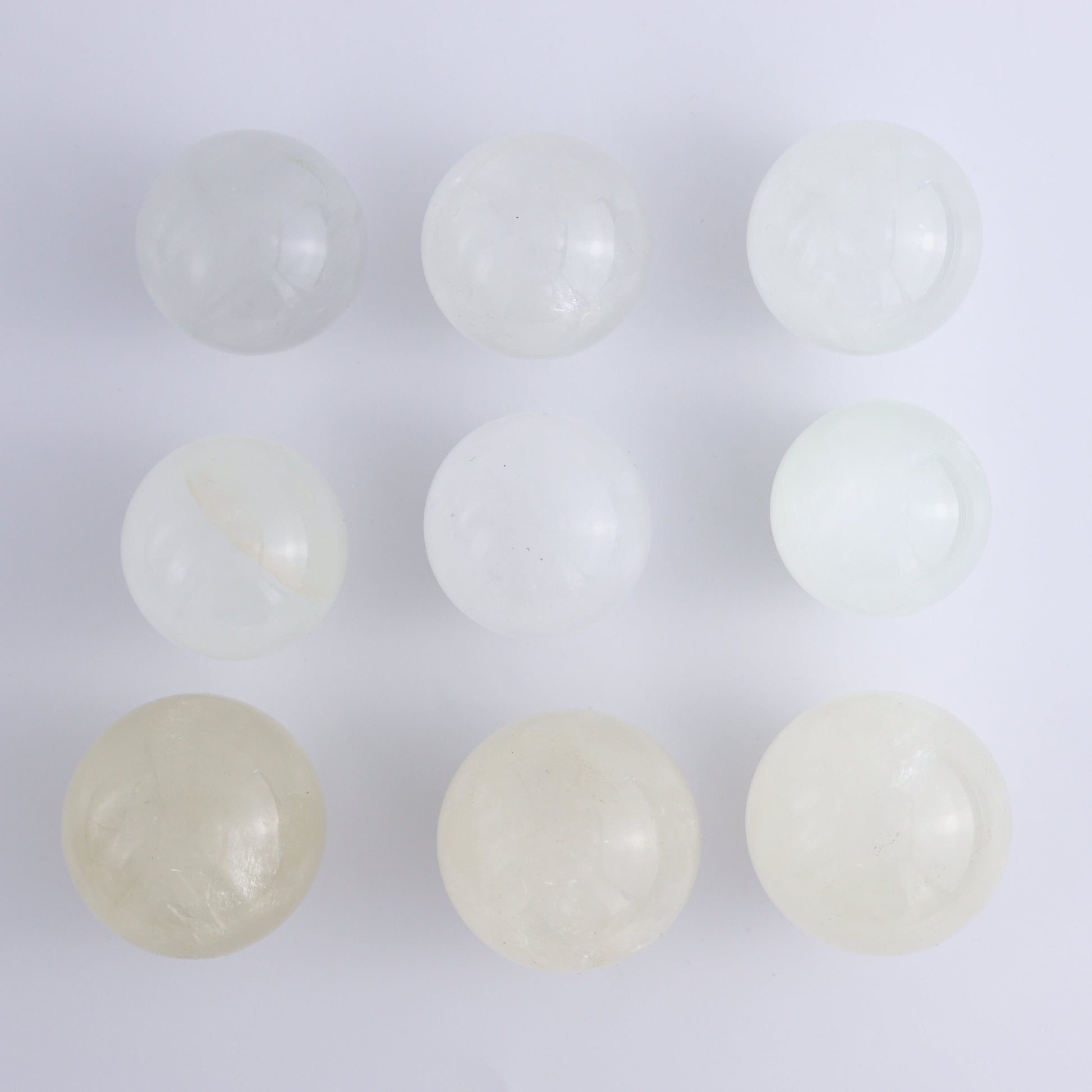 Calcite Spheres Set of 9 - Expert Wholesale and Supplier of Wholesale Crystals & Bulk Gemstones, ["Calcite","Mexico","Spheres"]