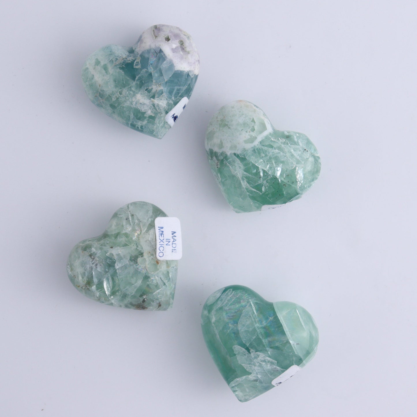 Fluorite Hearts Set of 7 - Expert Wholesale and Supplier of Wholesale Crystals & Bulk Gemstones, ["Fluorite","Hearts","Mexico"]
