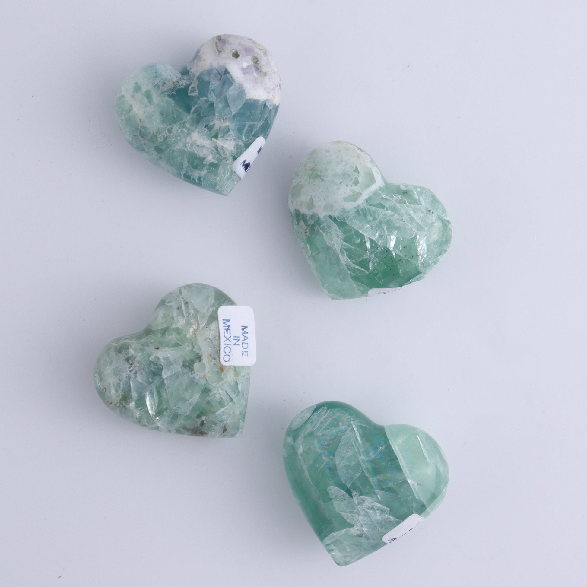 Fluorite Hearts Set of 7 - Expert Wholesale and Supplier of Wholesale Crystals & Bulk Gemstones, ["Fluorite","Hearts","Mexico"]