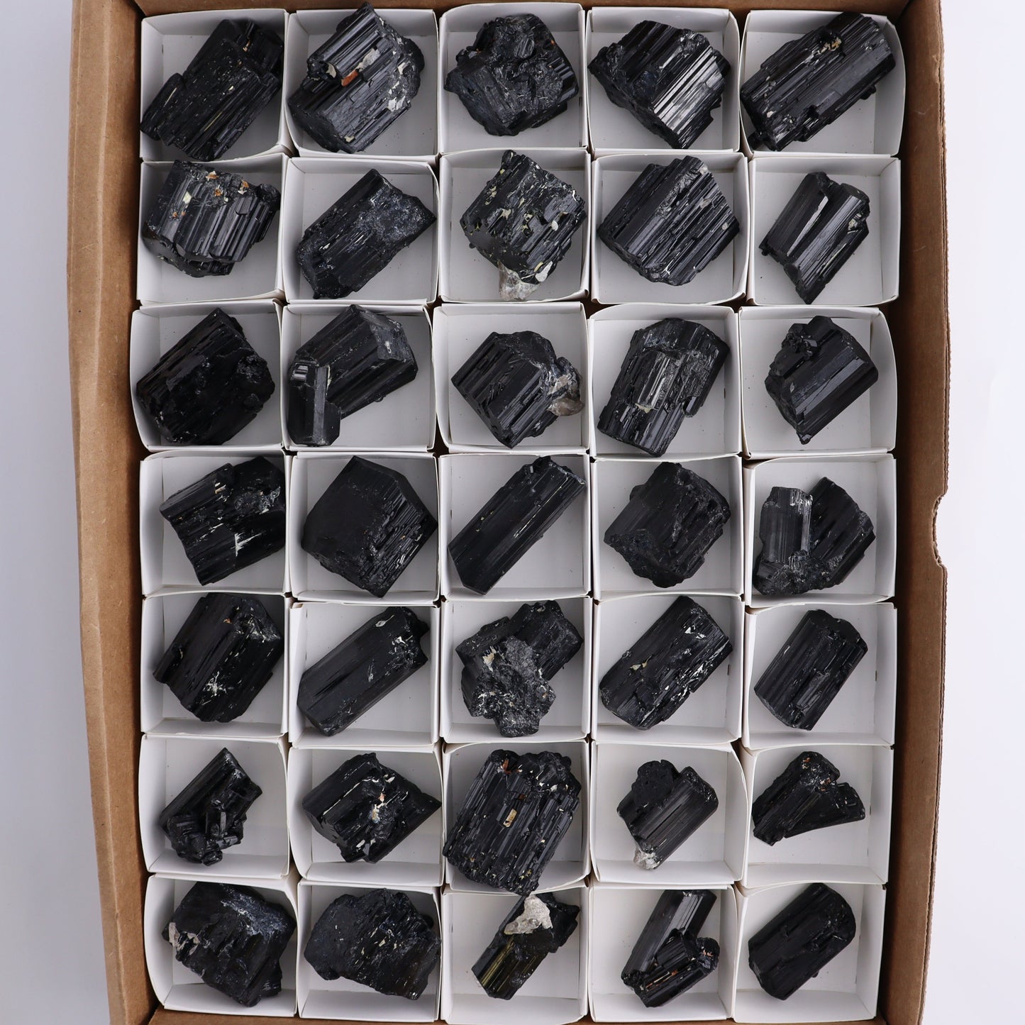 Black Tourmaline Roughs Set of 35 - Expert Wholesale and Supplier of Wholesale Crystals & Bulk Gemstones, ["Black Tourmaline","Madagascar","Rough","Tourmaline"]