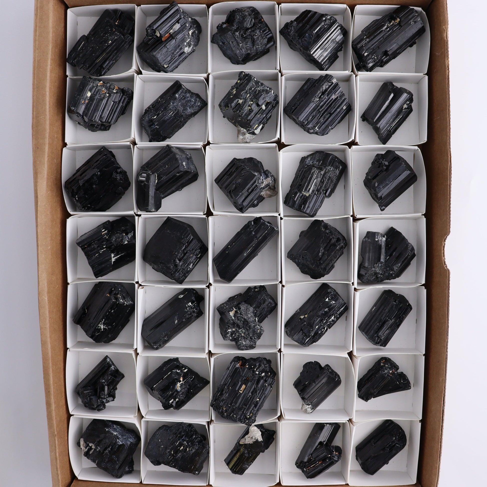 Black Tourmaline Roughs Set of 35 - Expert Wholesale and Supplier of Wholesale Crystals & Bulk Gemstones, ["Black Tourmaline","Madagascar","Rough","Tourmaline"]