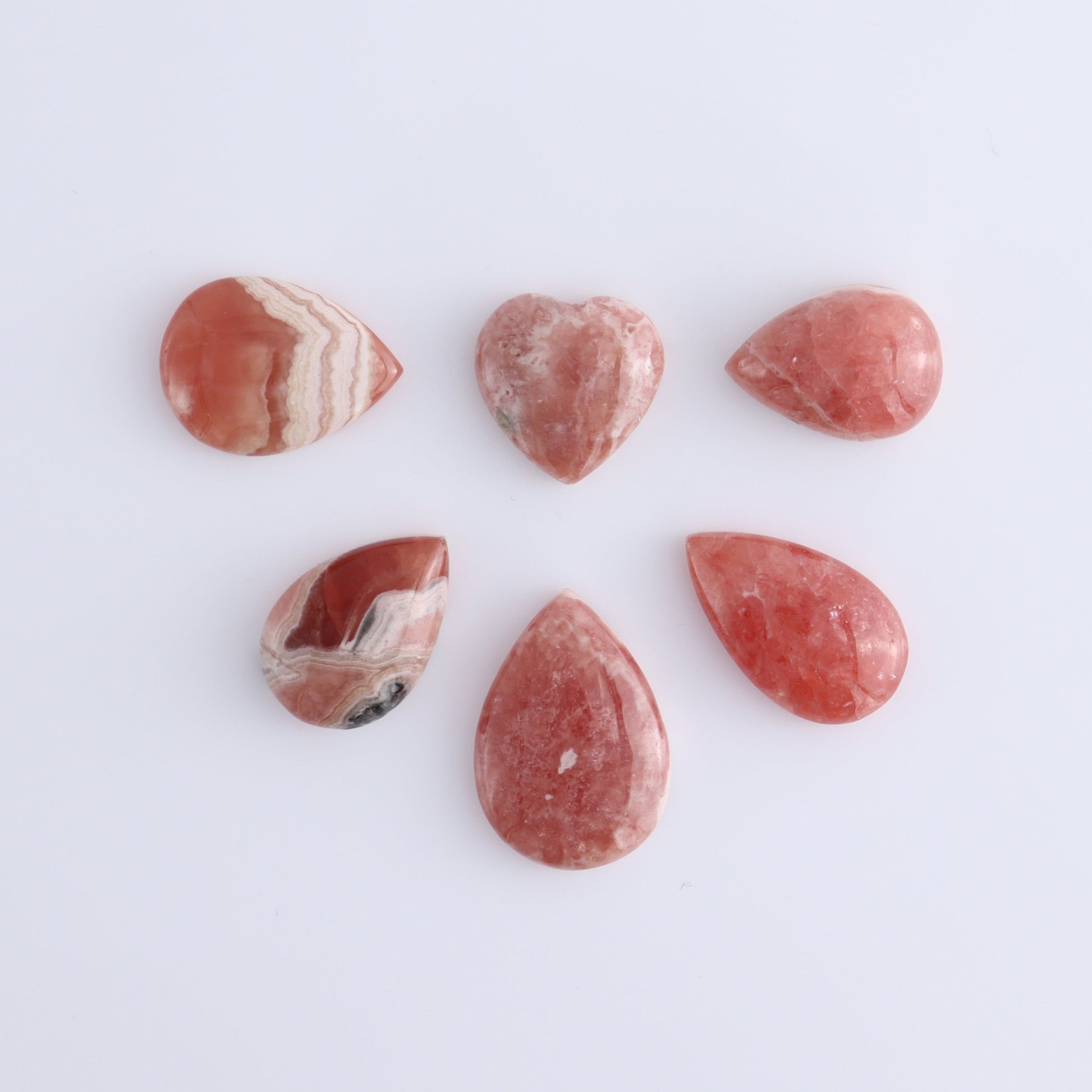 Rhodochrosite Cabs and Heart Set of 17 - Expert Wholesale and Supplier of Wholesale Crystals & Bulk Gemstones, ["Argentina","Cabs","Rhodochrosite"]