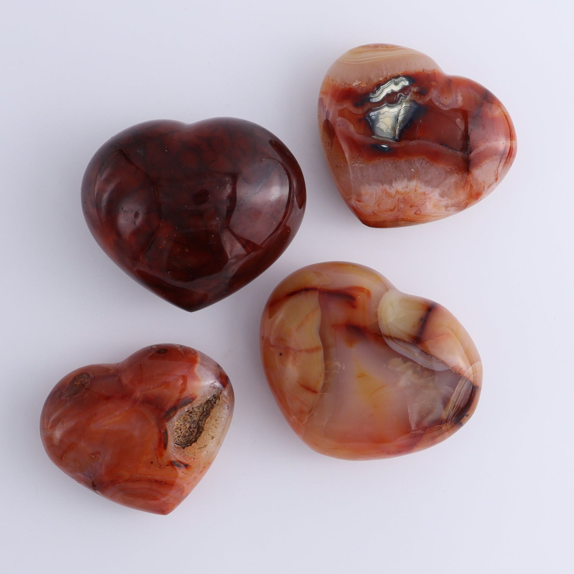 Carnelian Hearts Set of 12 - Expert Wholesale and Supplier of Wholesale Crystals & Bulk Gemstones, ["carnelian","Hearts","Madagascar"]