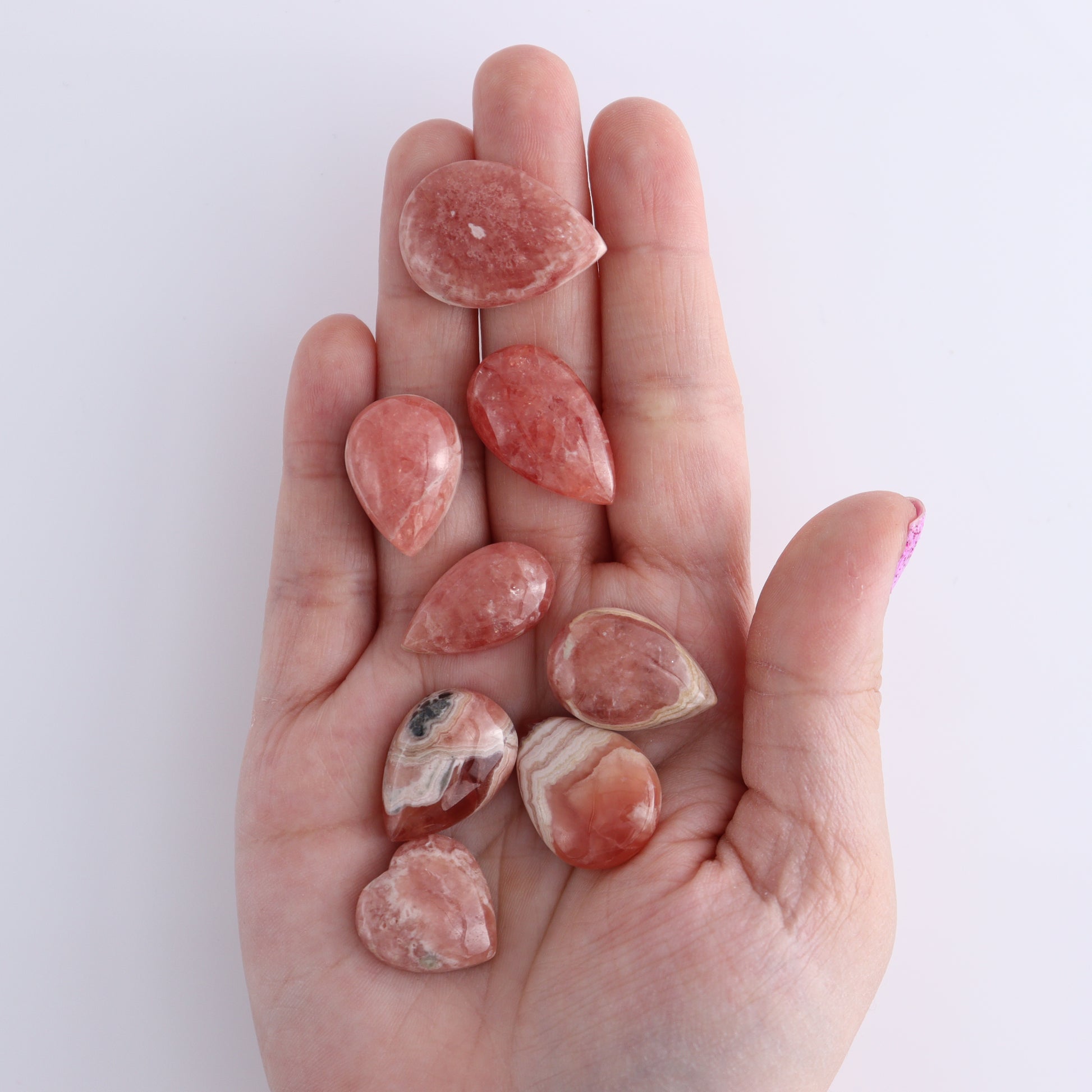 Rhodochrosite Cabs and Heart Set of 17 - Expert Wholesale and Supplier of Wholesale Crystals & Bulk Gemstones, ["Argentina","Cabs","Rhodochrosite"]
