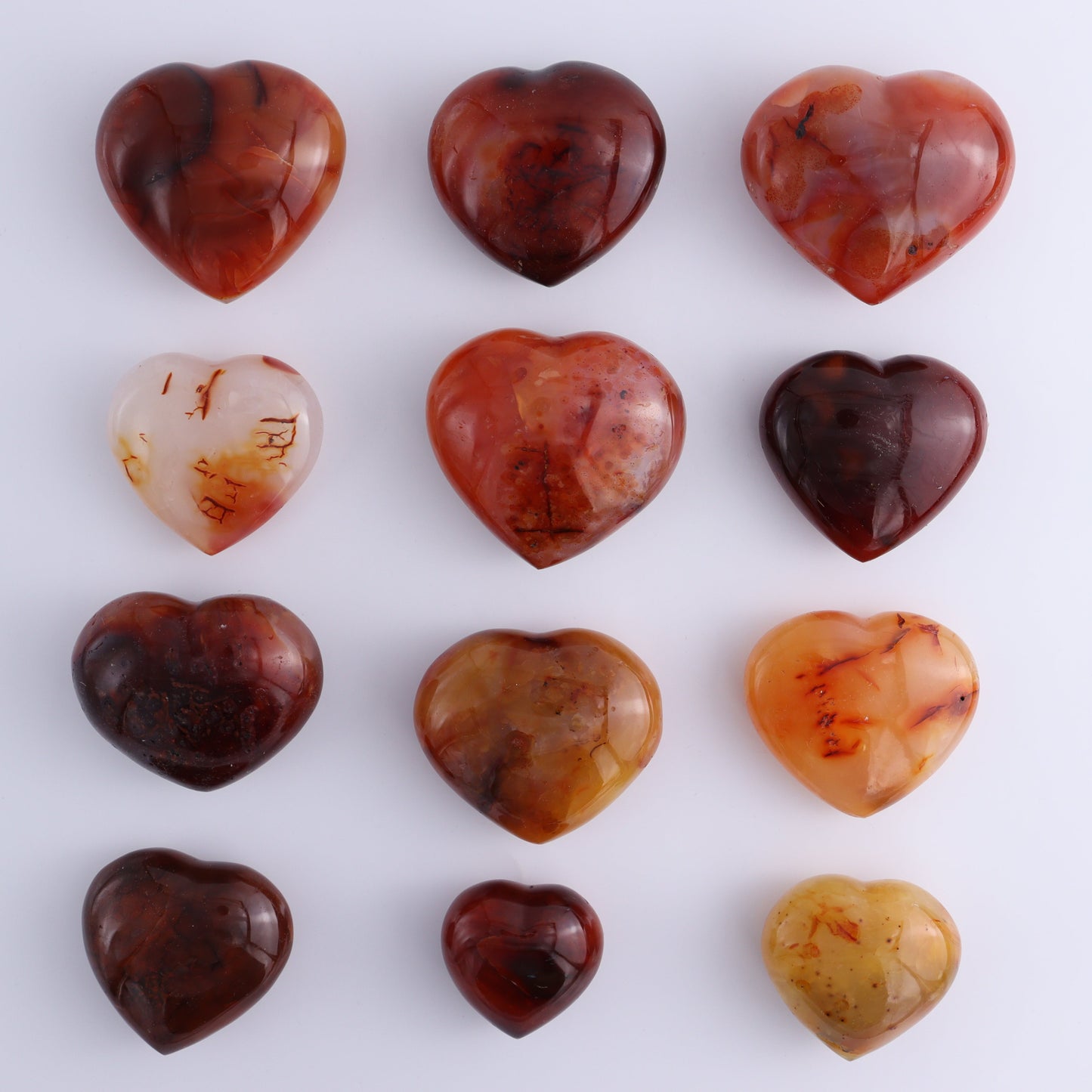 Carnelian Hearts Set of 12 - Expert Wholesale and Supplier of Wholesale Crystals & Bulk Gemstones, ["carnelian","Hearts","Madagascar"]