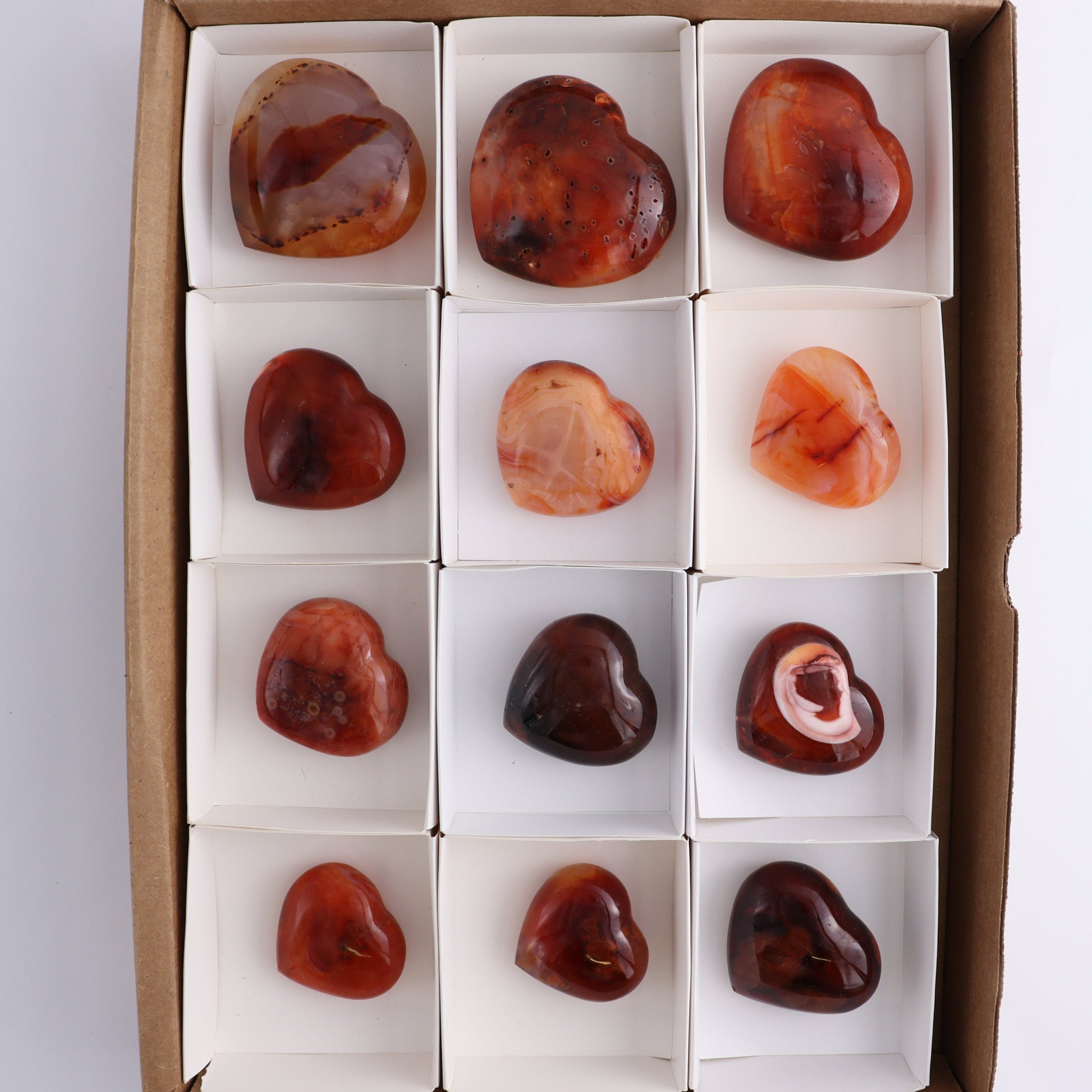 Carnelian Hearts Set of 12 - Expert Wholesale and Supplier of Wholesale Crystals & Bulk Gemstones, ["carnelian","Hearts","Madagascar"]
