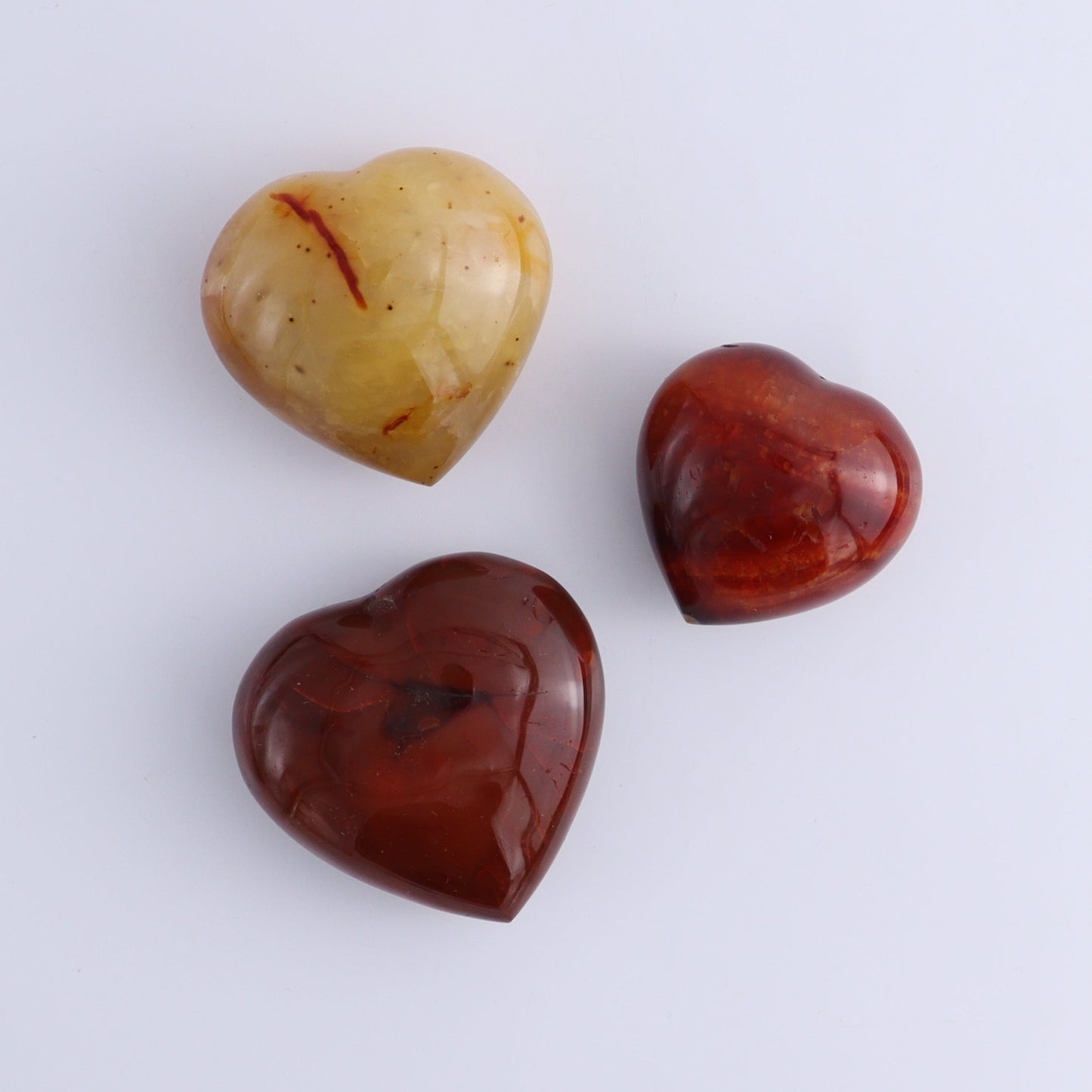 Carnelian Hearts Set of 12 - Expert Wholesale and Supplier of Wholesale Crystals & Bulk Gemstones, ["carnelian","Hearts","Madagascar"]