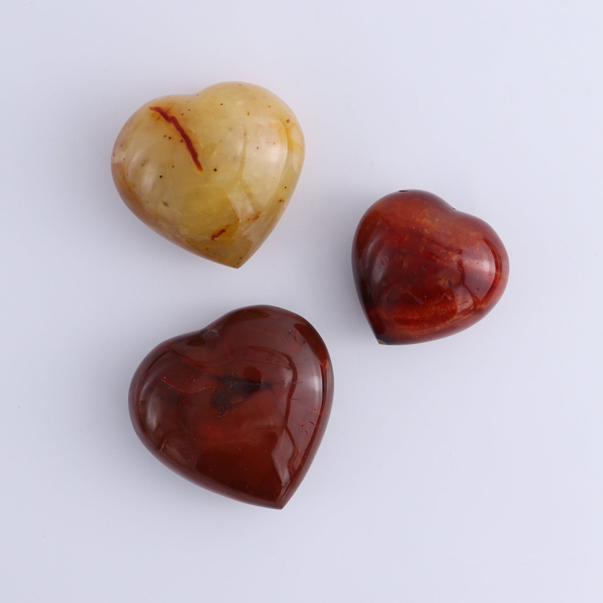 Carnelian Hearts Set of 12 - Expert Wholesale and Supplier of Wholesale Crystals & Bulk Gemstones, ["carnelian","Hearts","Madagascar"]