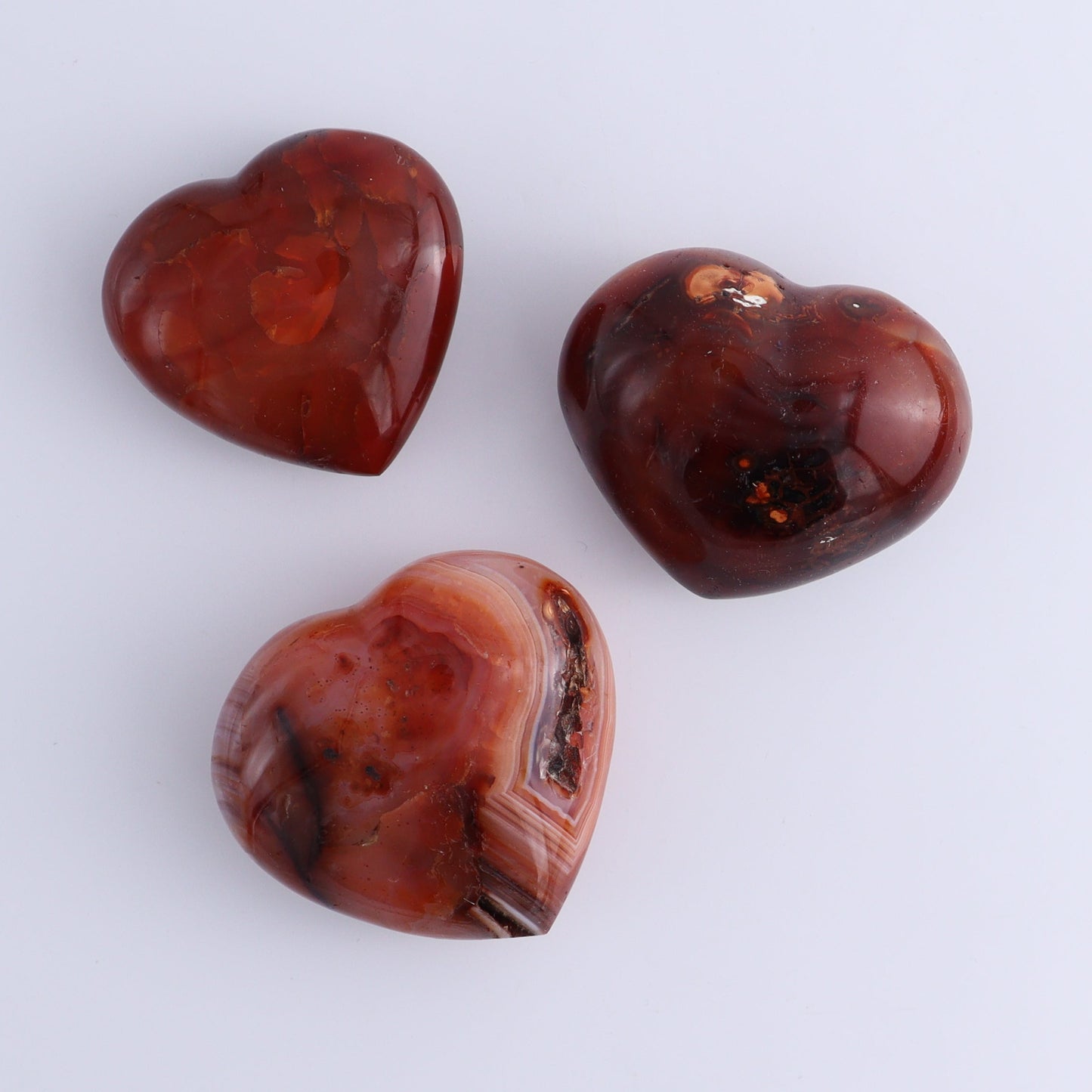 Carnelian Hearts Set of 12 - Expert Wholesale and Supplier of Wholesale Crystals & Bulk Gemstones, ["carnelian","Hearts","Madagascar"]