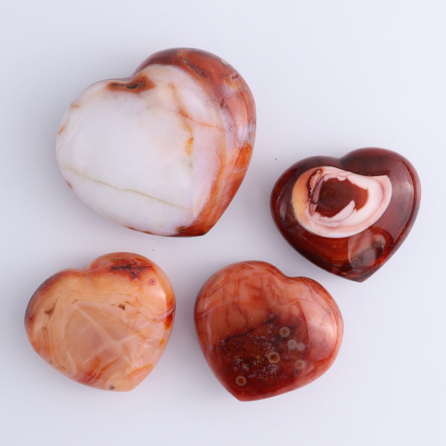 Carnelian Hearts Set of 12 - Expert Wholesale and Supplier of Wholesale Crystals & Bulk Gemstones, ["carnelian","Hearts","Madagascar"]