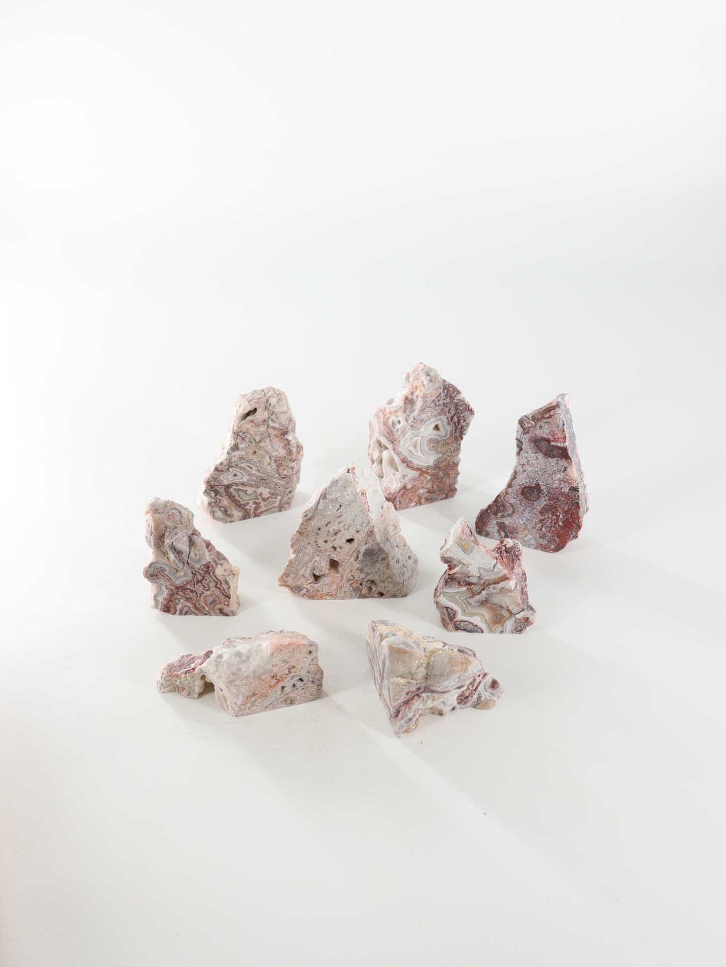 Crazy Lace Agate Cut Base Set of 8 - Expert Supplier of Wholesale Crystals & Bulk Gemstones