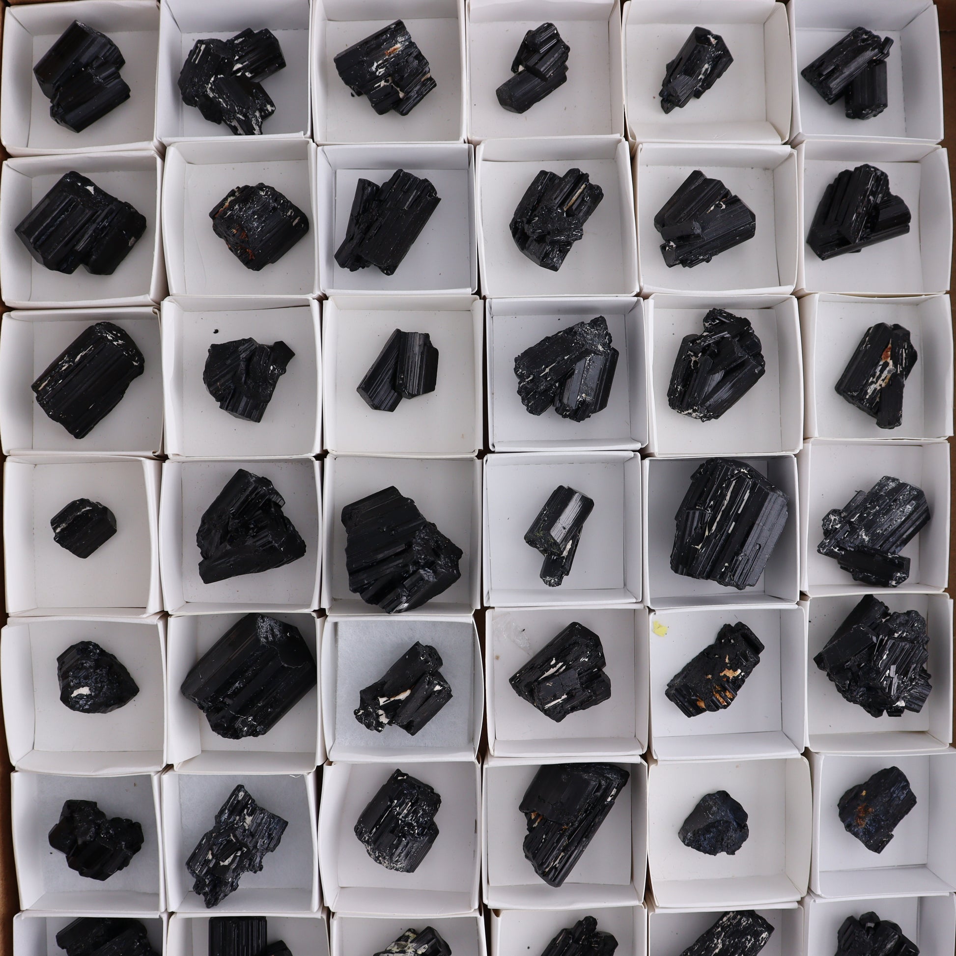 Black Tourmaline Roughs Set of 54 - Expert Wholesale and Supplier of Wholesale Crystals & Bulk Gemstones, ["Black Tourmaline","Madagascar","Rough","Tourmaline"]