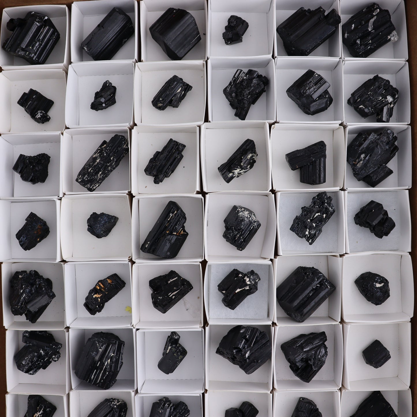 Black Tourmaline Roughs Set of 54 - Expert Wholesale and Supplier of Wholesale Crystals & Bulk Gemstones, ["Black Tourmaline","Madagascar","Rough","Tourmaline"]