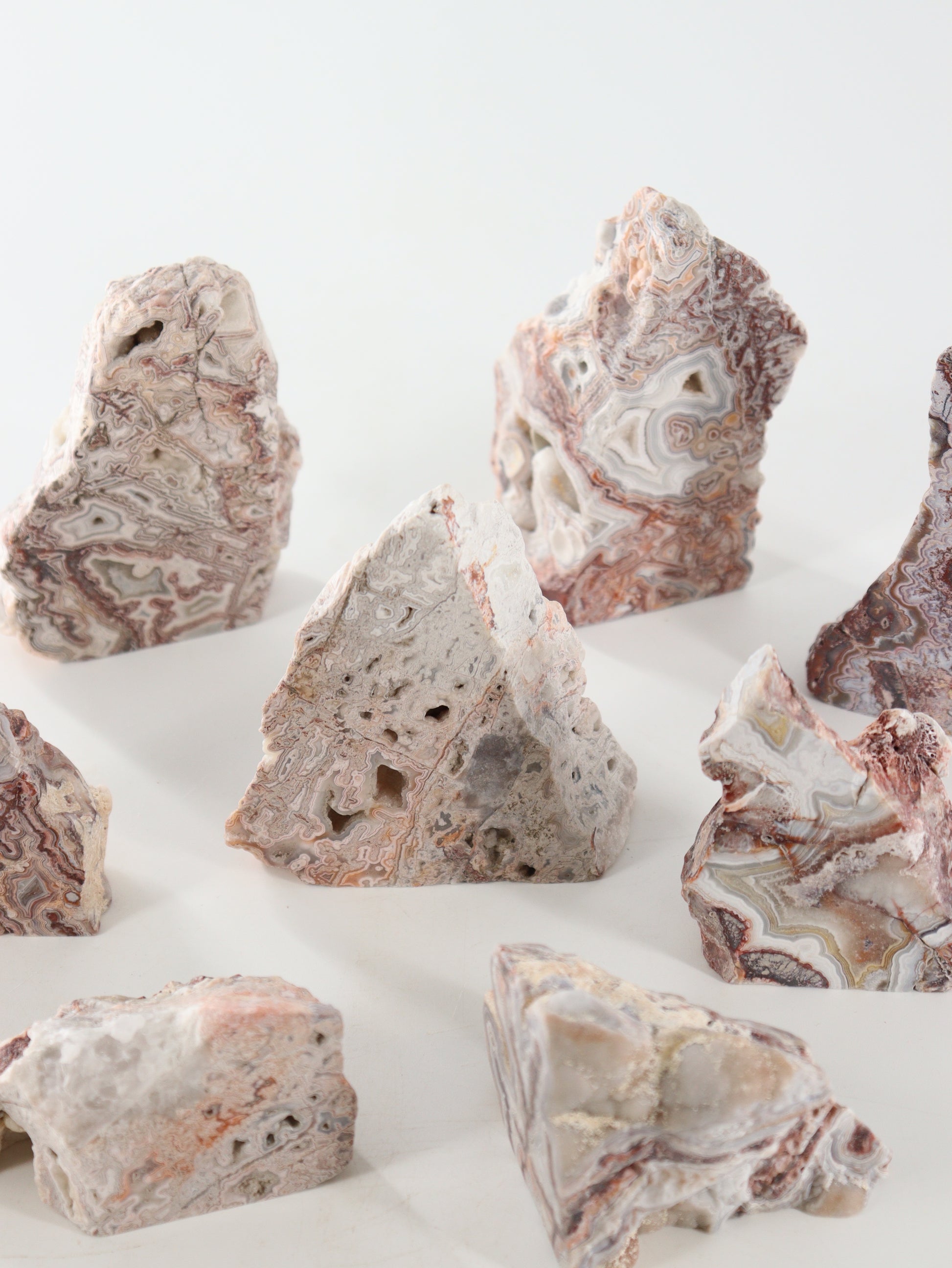 Crazy Lace Agate Cut Base Set of 8 - Expert Supplier of Wholesale Crystals & Bulk Gemstones