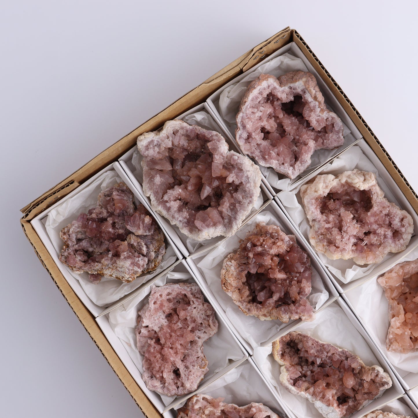 Pink Amethyst Geodes Flat of 12 - Expert Wholesale and Supplier of Wholesale Crystals & Bulk Gemstones, ["Amethyst","Pink Amethyst"]