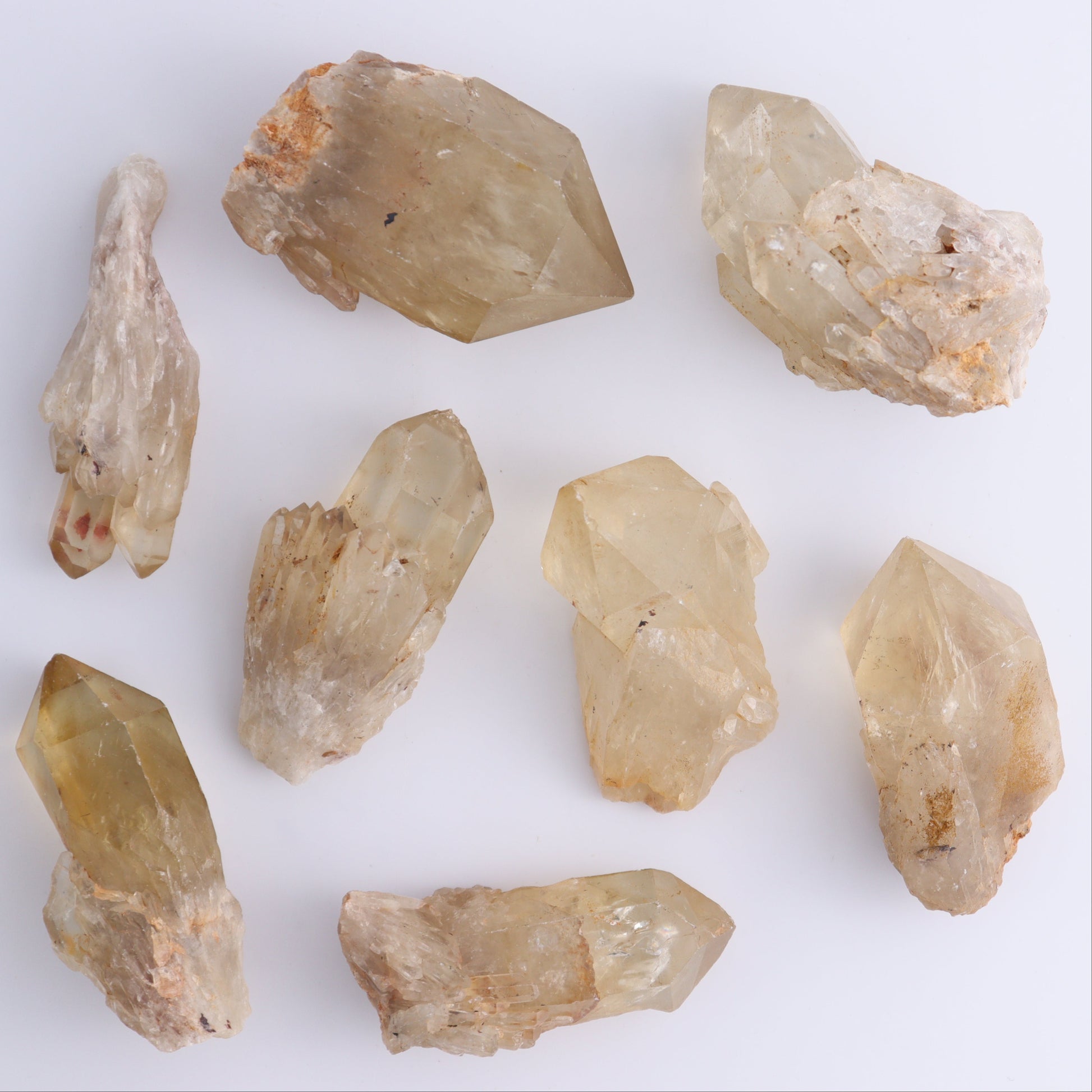 Imperfect Citrine Points Set of 12 - Expert Wholesale and Supplier of Wholesale Crystals & Bulk Gemstones, ["Citrine","Points","Rough","Roughs"]