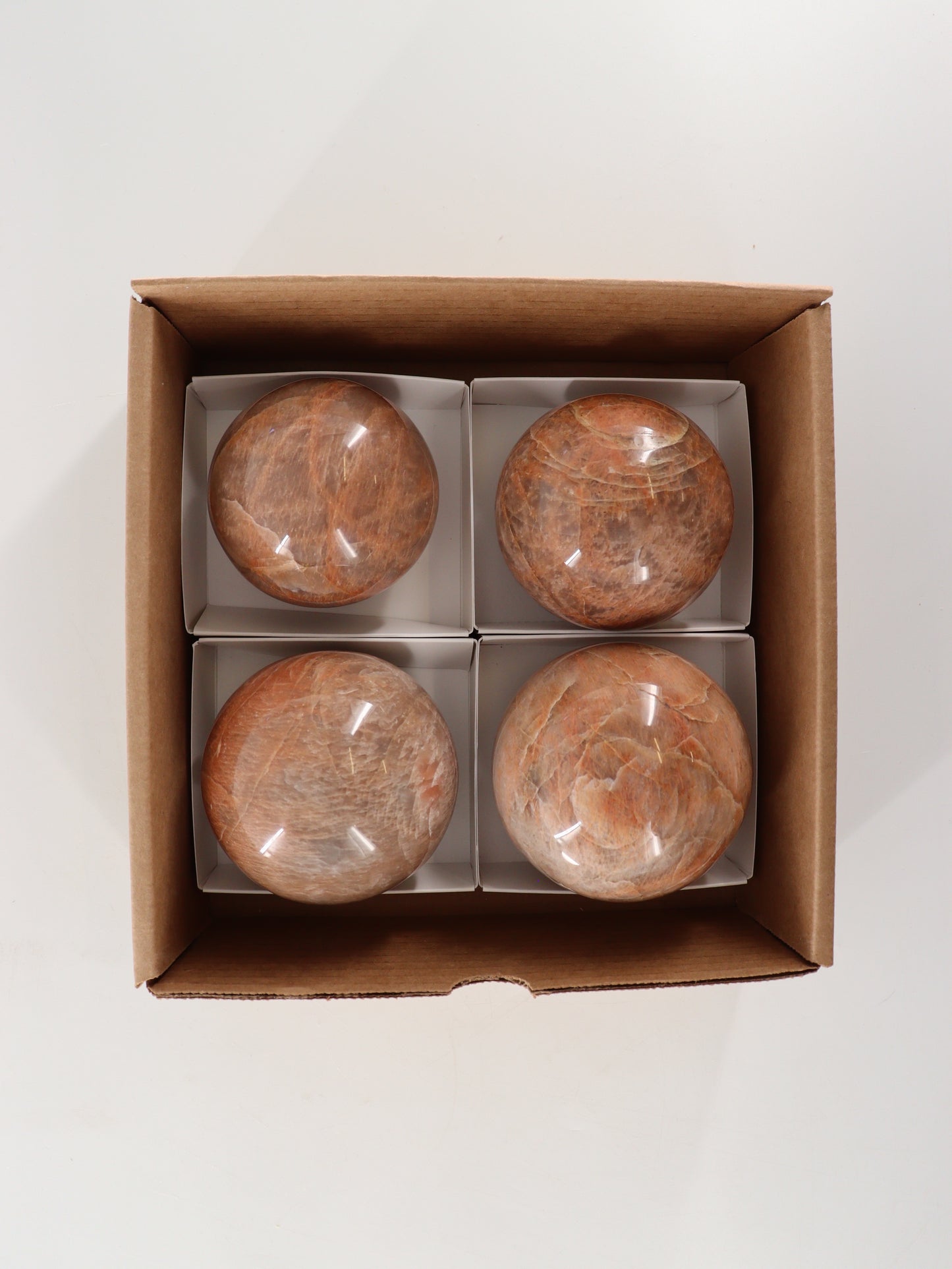 Peach Moonstone Spheres Set of 4 - Expert Wholesale and Supplier of Wholesale Crystals & Bulk Gemstones, []