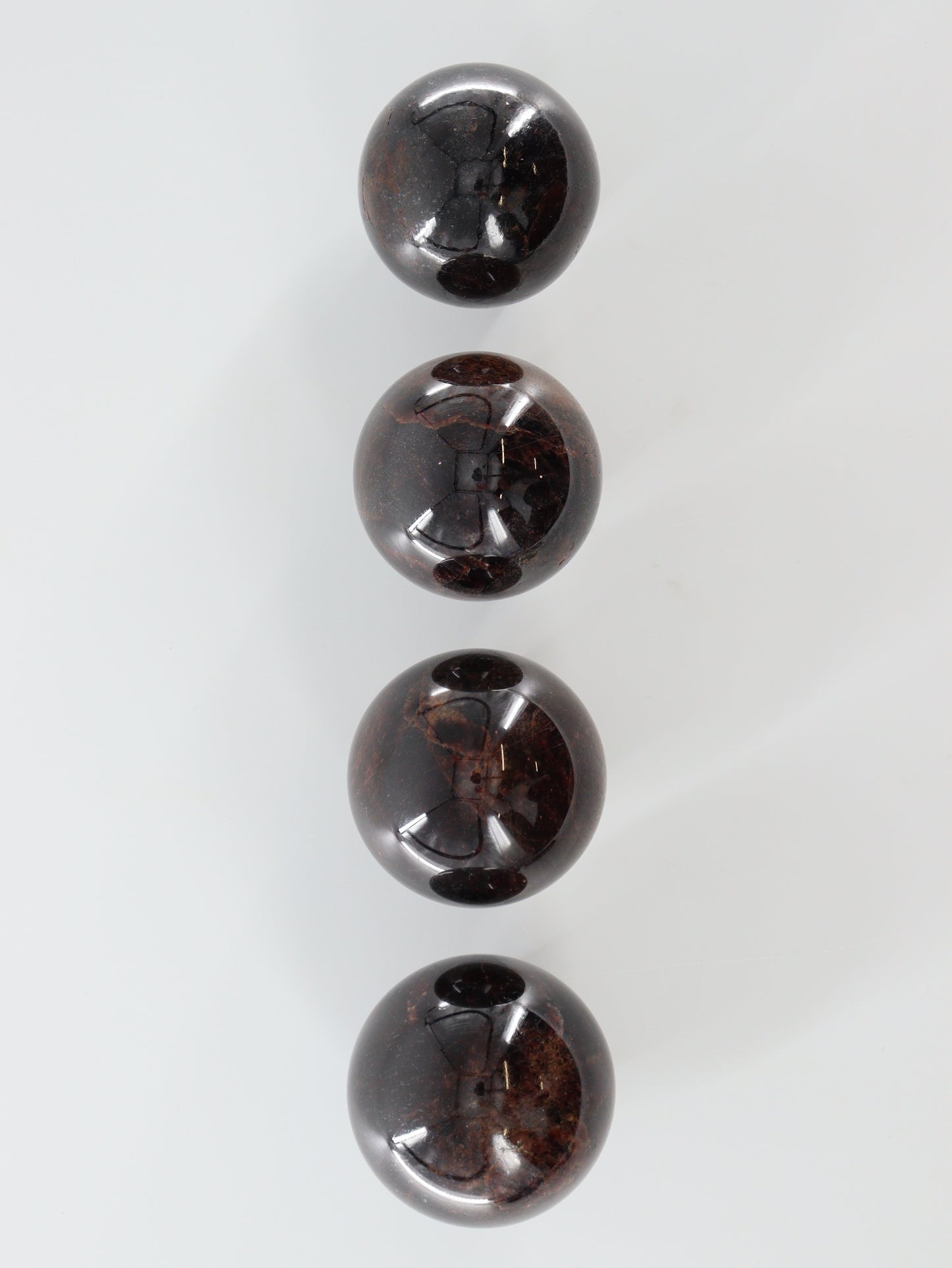 Garnet Spheres Set of 4 - Expert Supplier of Wholesale Crystals & Bulk Gemstones