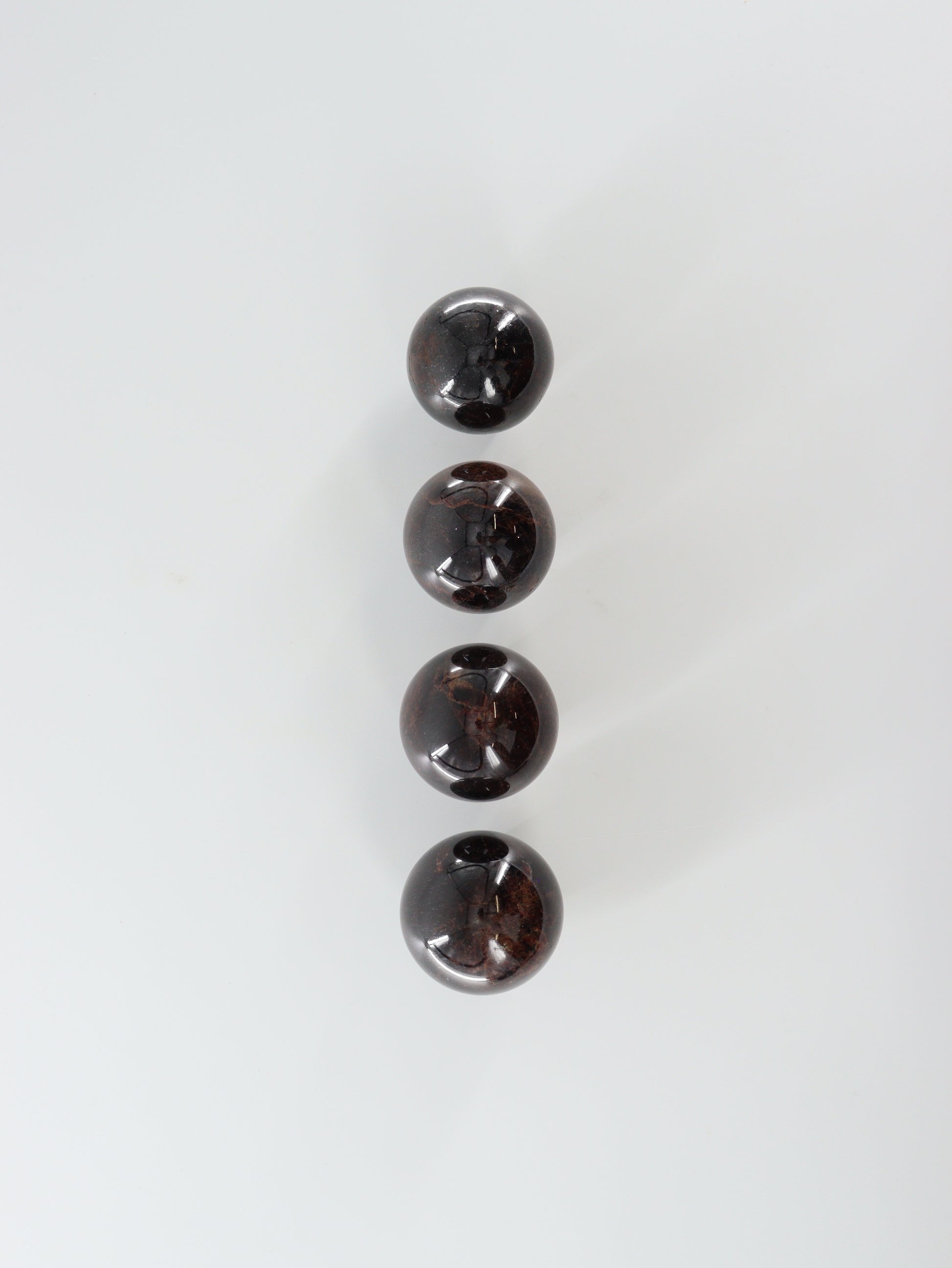 Garnet Spheres Set of 4 - Expert Supplier of Wholesale Crystals & Bulk Gemstones