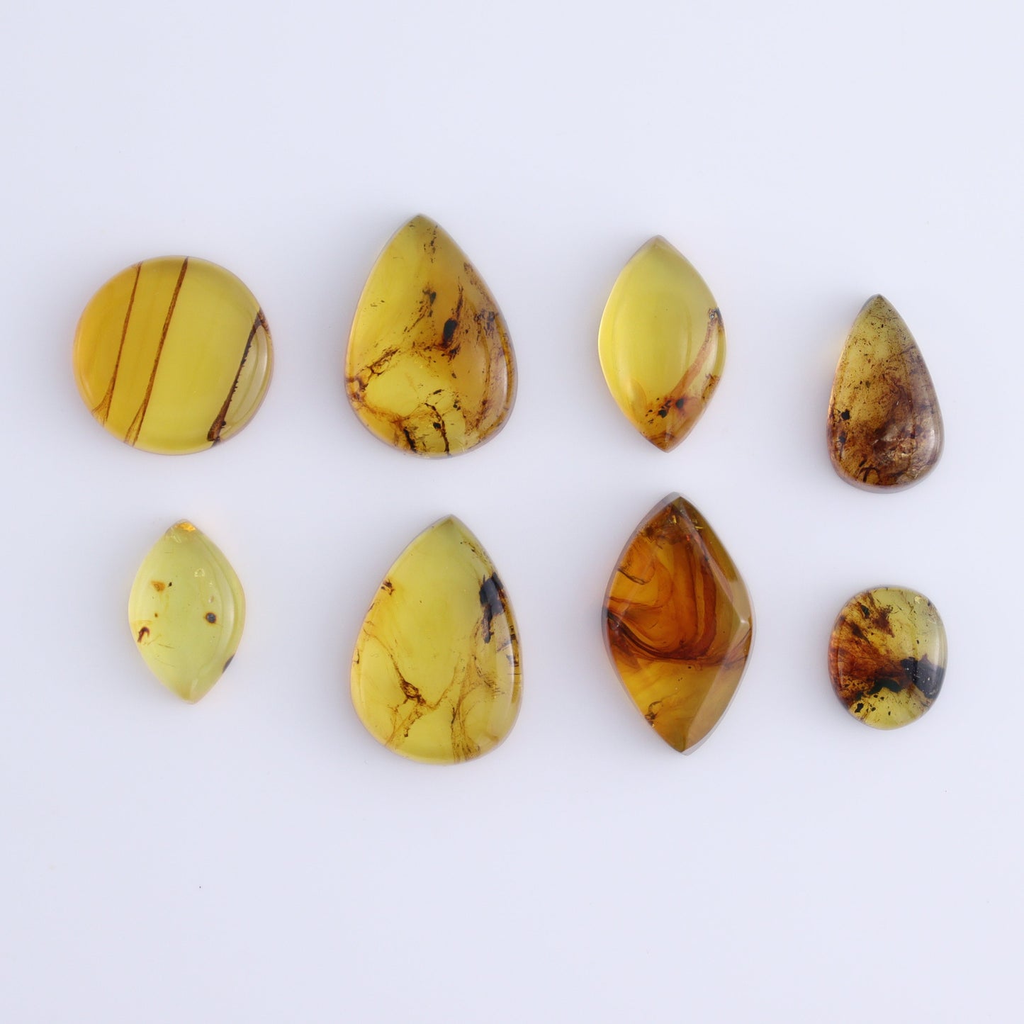 Chiapas Mexico Amber Cabs Set of 8 - Expert Wholesale and Supplier of Wholesale Crystals & Bulk Gemstones, ["Amber","Cabs","Chiapas Amber","Mexico"]