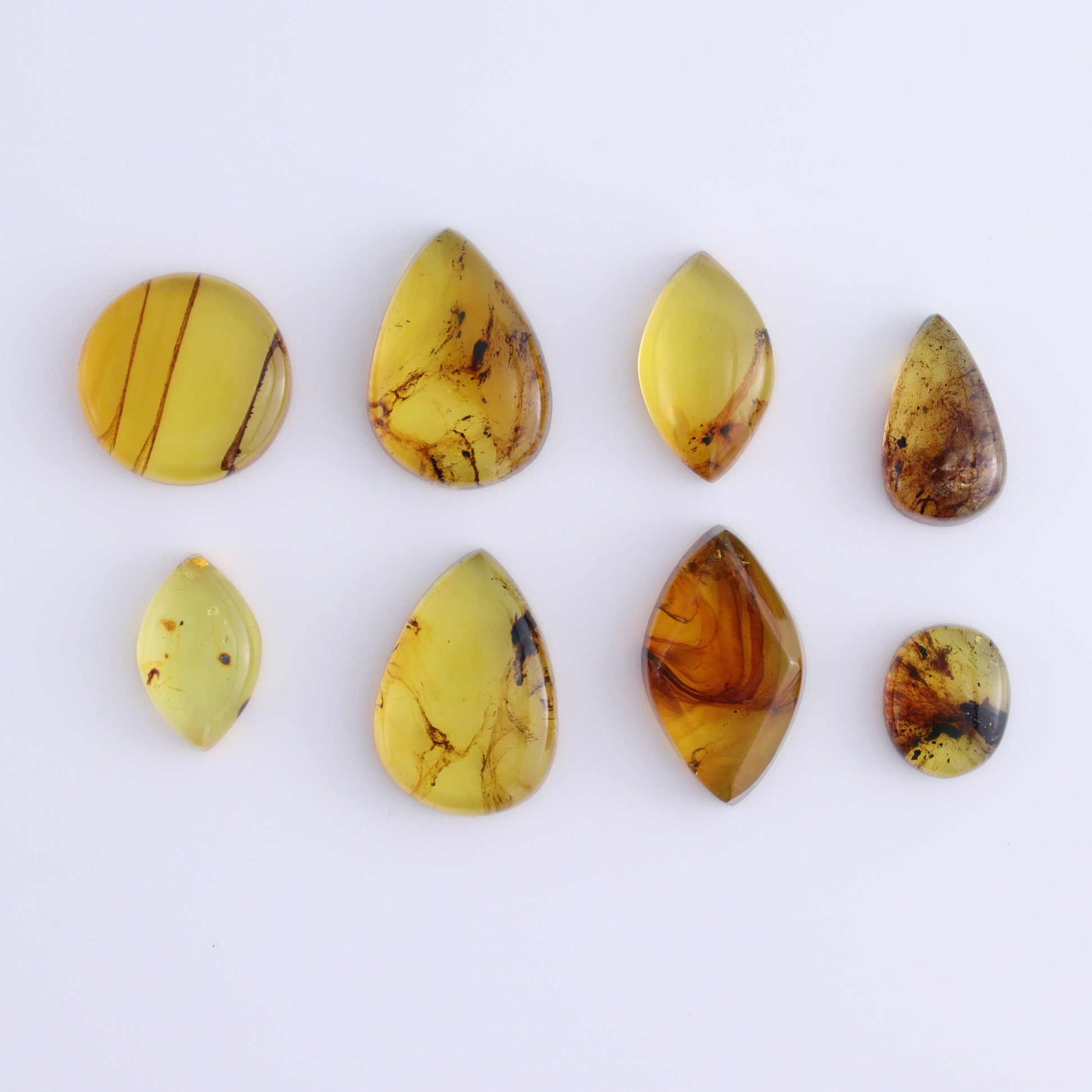 Chiapas Mexico Amber Cabs Set of 8 - Expert Wholesale and Supplier of Wholesale Crystals & Bulk Gemstones, ["Amber","Cabs","Chiapas Amber","Mexico"]