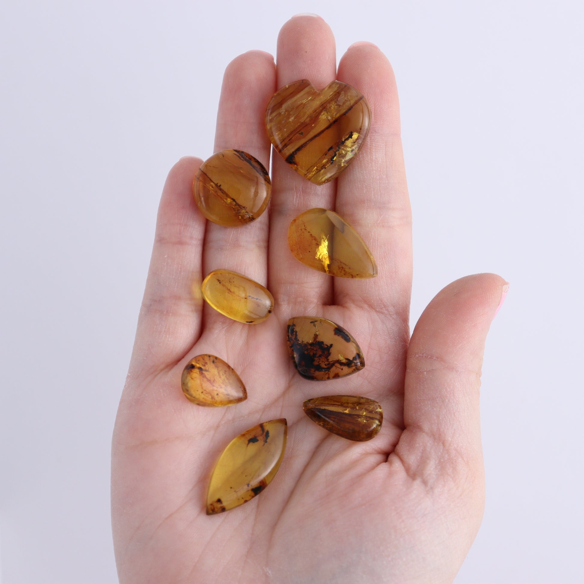 Chiapas Mexico Amber Cabs Set of 8 - Expert Wholesale and Supplier of Wholesale Crystals & Bulk Gemstones, ["Amber","Cabs","Chiapas Amber","Mexico"]