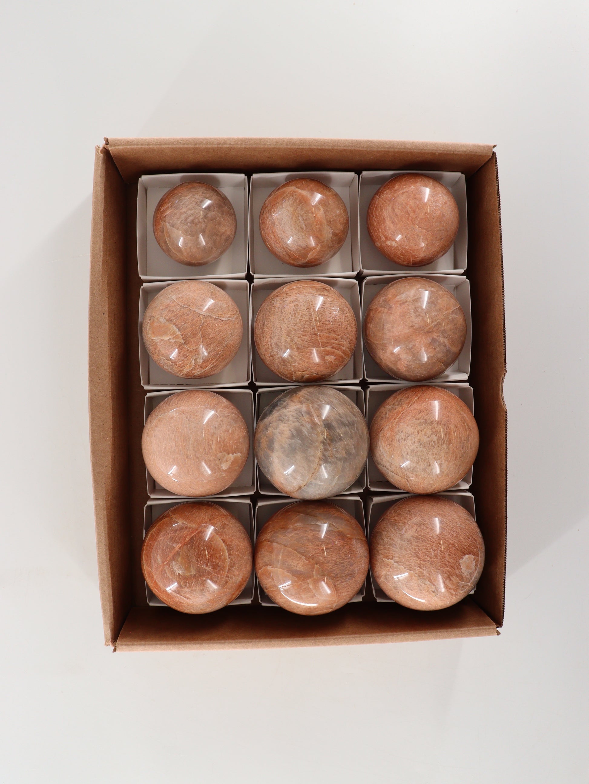 Peach Moonstone Spheres Set of 12 - Expert Wholesale and Supplier of Wholesale Crystals & Bulk Gemstones, []
