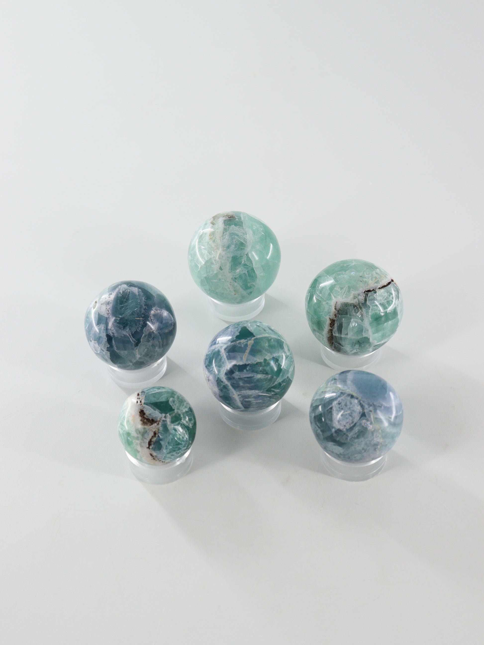 Fluorite Spheres Set of 6 - Expert Wholesale and Supplier of Wholesale Crystals & Bulk Gemstones, []