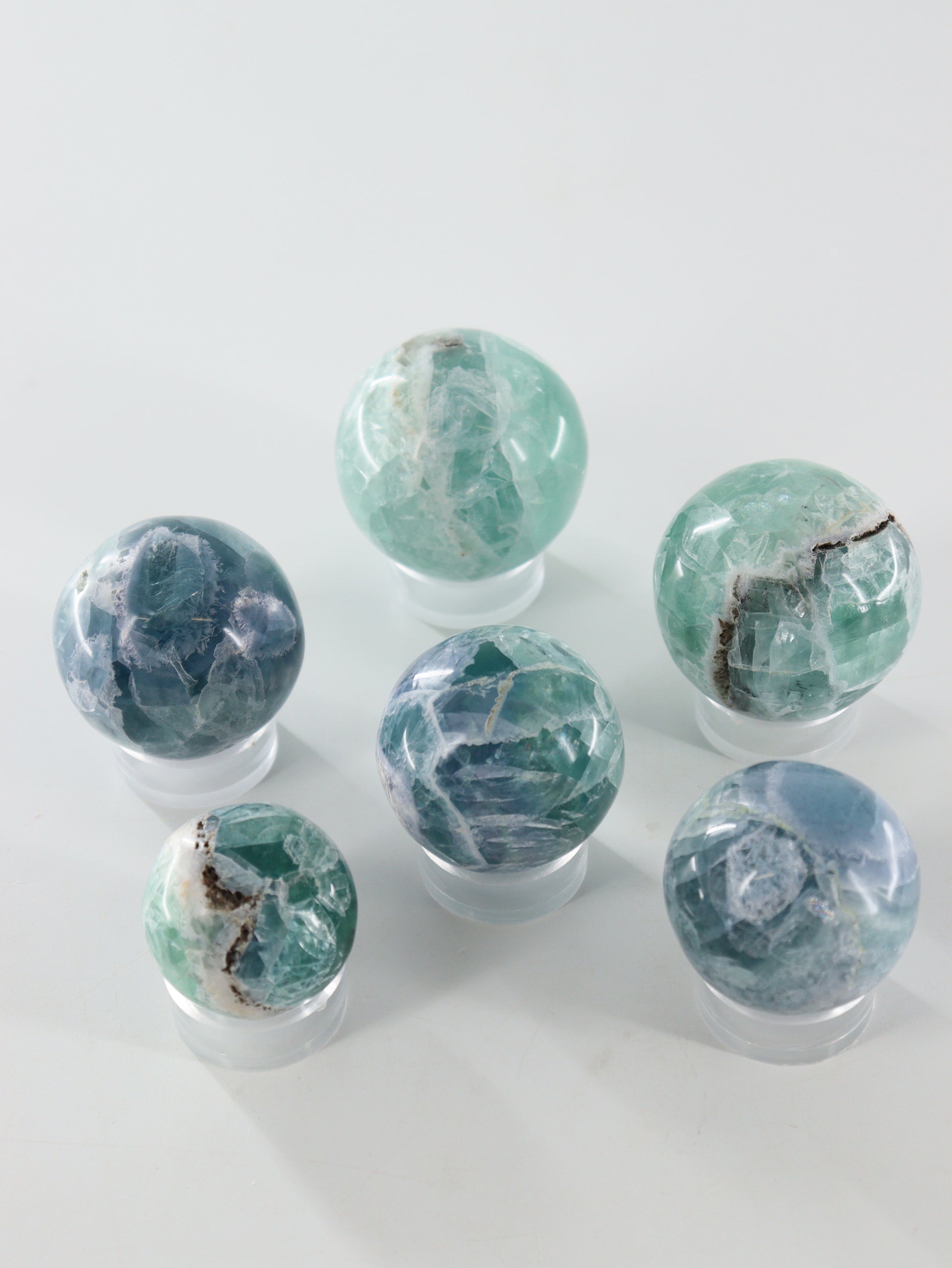 Fluorite Spheres Set of 6 - Expert Wholesale and Supplier of Wholesale Crystals & Bulk Gemstones, []