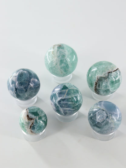 Fluorite Spheres Set of 6 - Expert Wholesale and Supplier of Wholesale Crystals & Bulk Gemstones, []