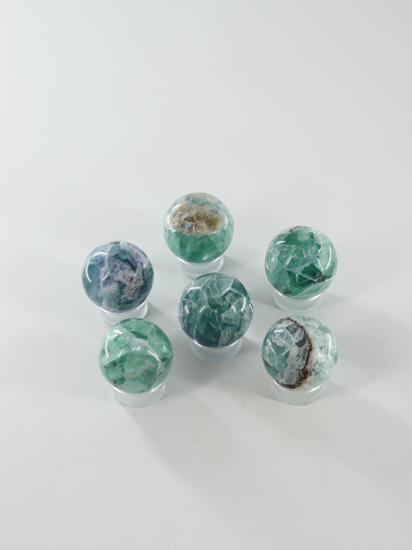 Fluorite Spheres Set of 6 - Expert Wholesale and Supplier of Wholesale Crystals & Bulk Gemstones, []