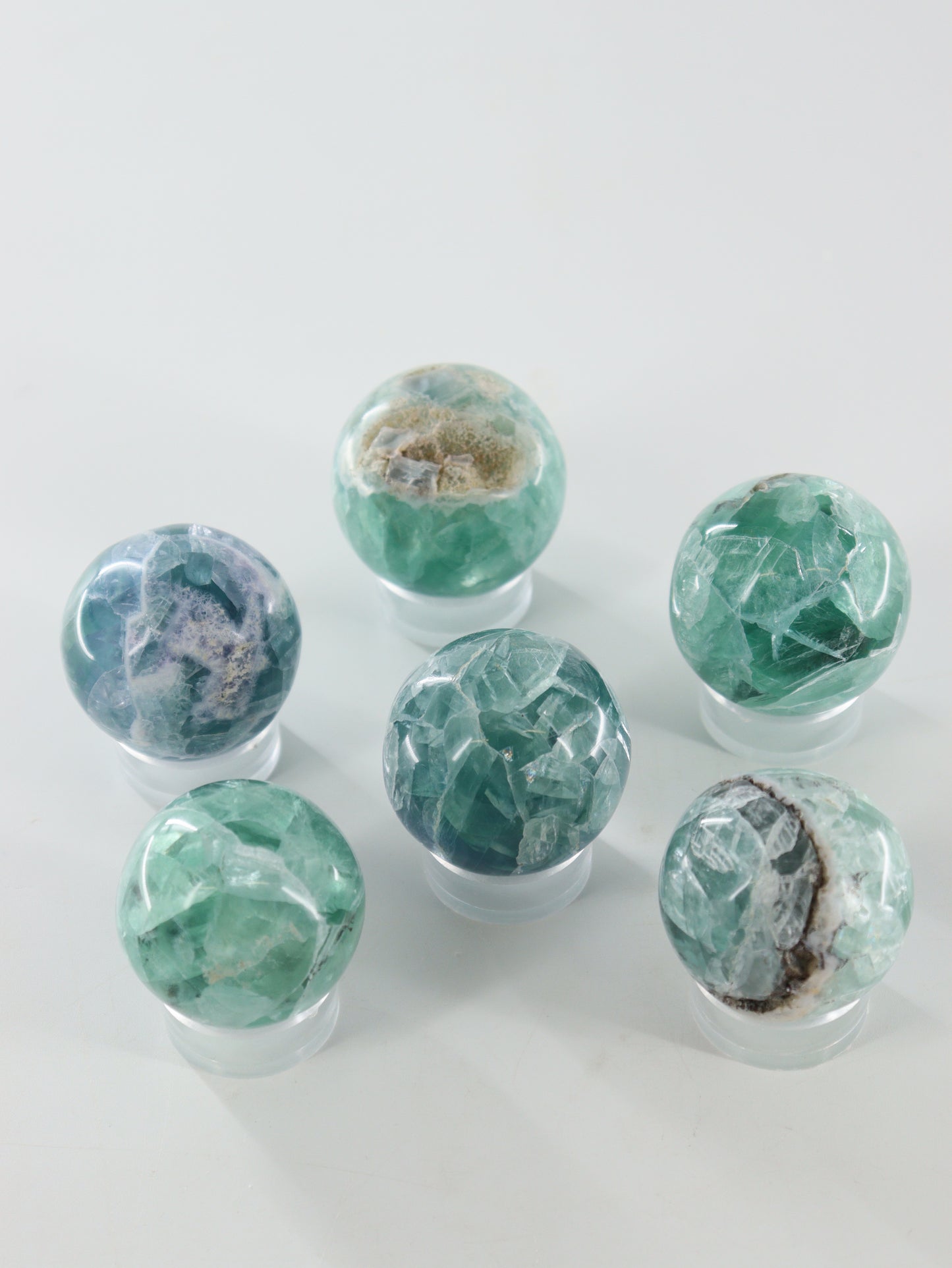 Fluorite Spheres Set of 6 - Expert Wholesale and Supplier of Wholesale Crystals & Bulk Gemstones, []