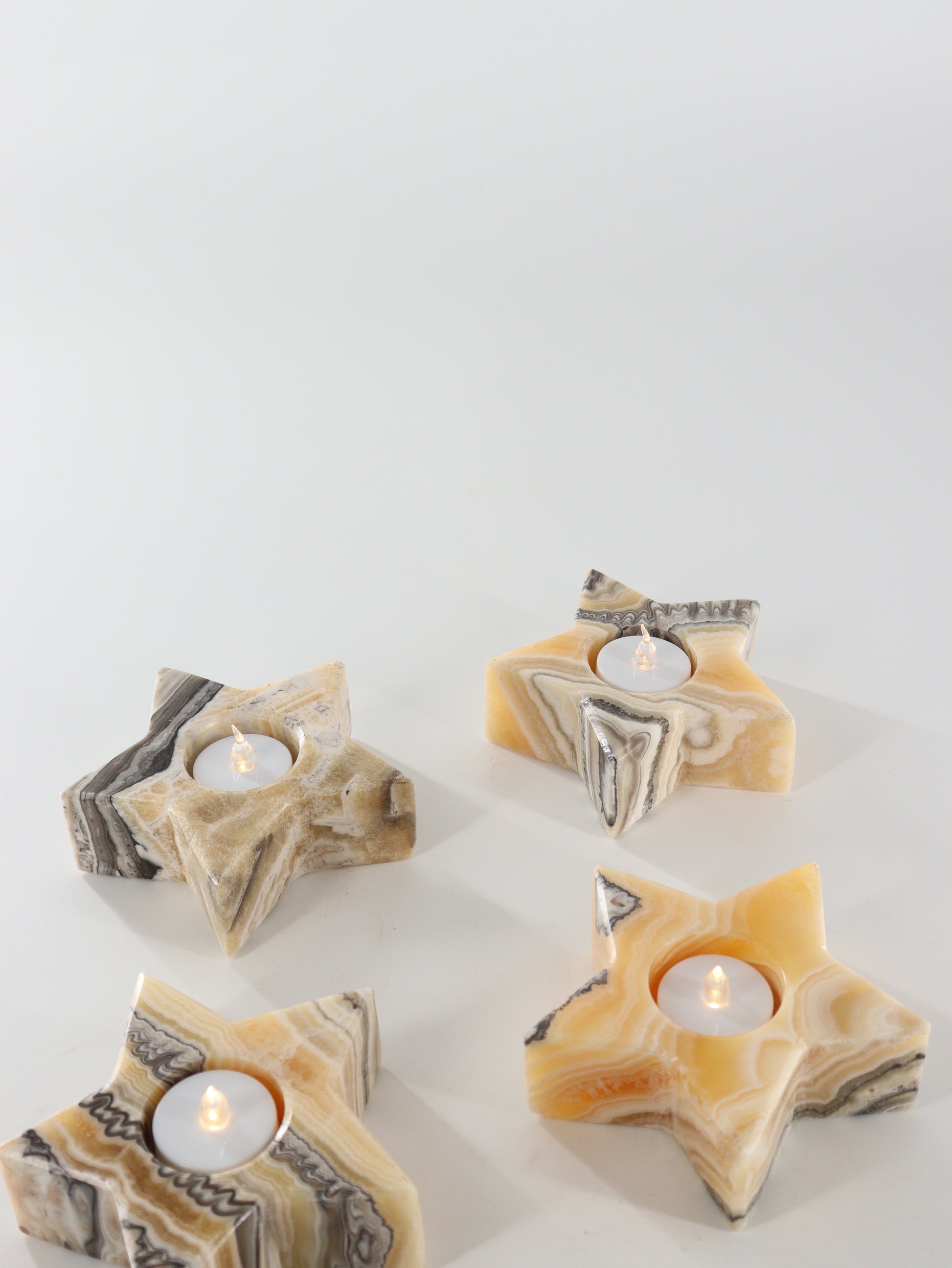 Yellow Zebra Onyx Star Candle Holders Set of 4 - Expert Supplier of Wholesale Crystals & Bulk Gemstones