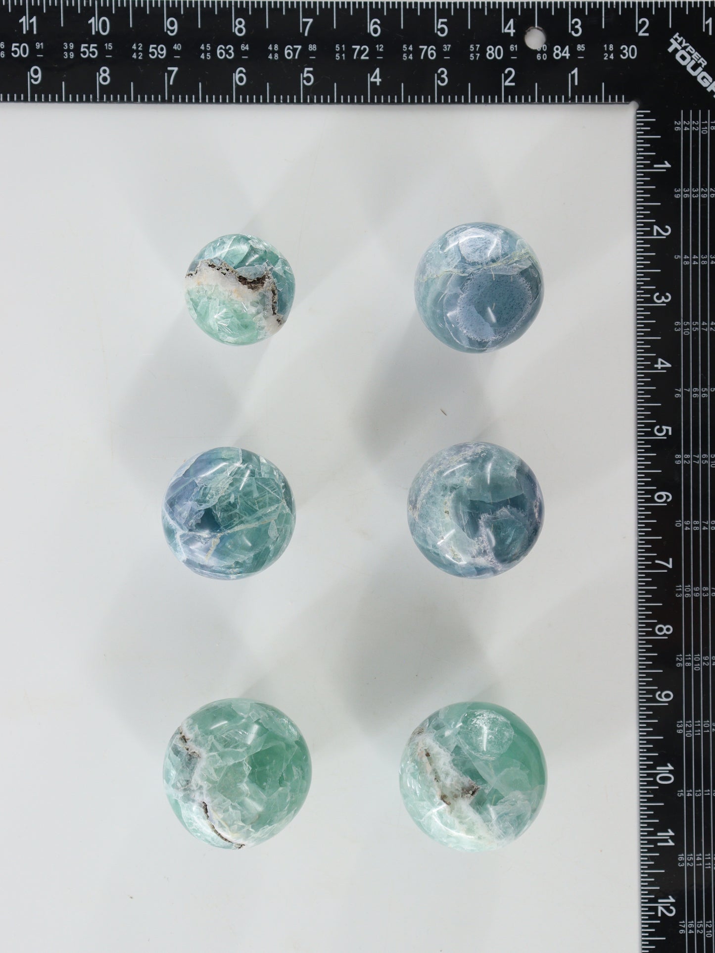 Fluorite Spheres Set of 6 - Expert Wholesale and Supplier of Wholesale Crystals & Bulk Gemstones, []