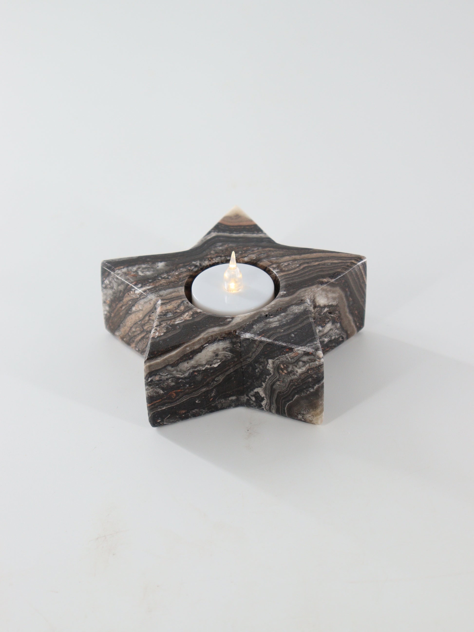 Zebra Onyx Star Candle Holders Set of 4 - Expert Supplier of Wholesale Crystals & Bulk Gemstones