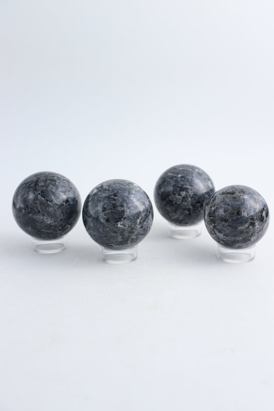 Four Larvikite Spheres