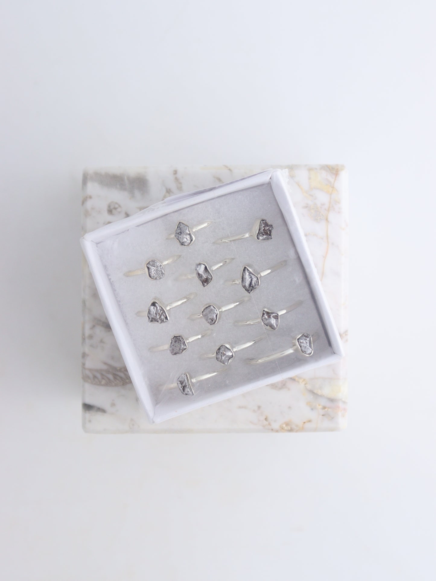 Meteorite Rings Box of 12 - Expert Supplier of Wholesale Crystals & Bulk Gemstones