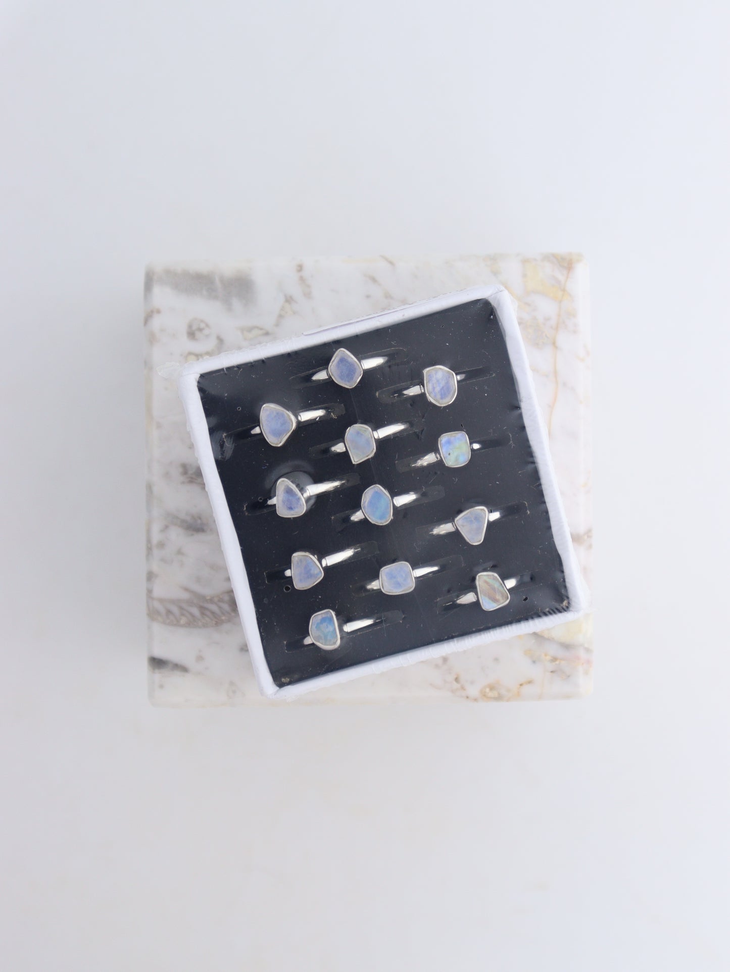 Rainbow Moonstone Adjustable Rings Box of 12 - Expert Wholesale and Supplier of Wholesale Crystals & Bulk Gemstones, ["Jewelry","Rainbow Moonstone","Ring","rings"]